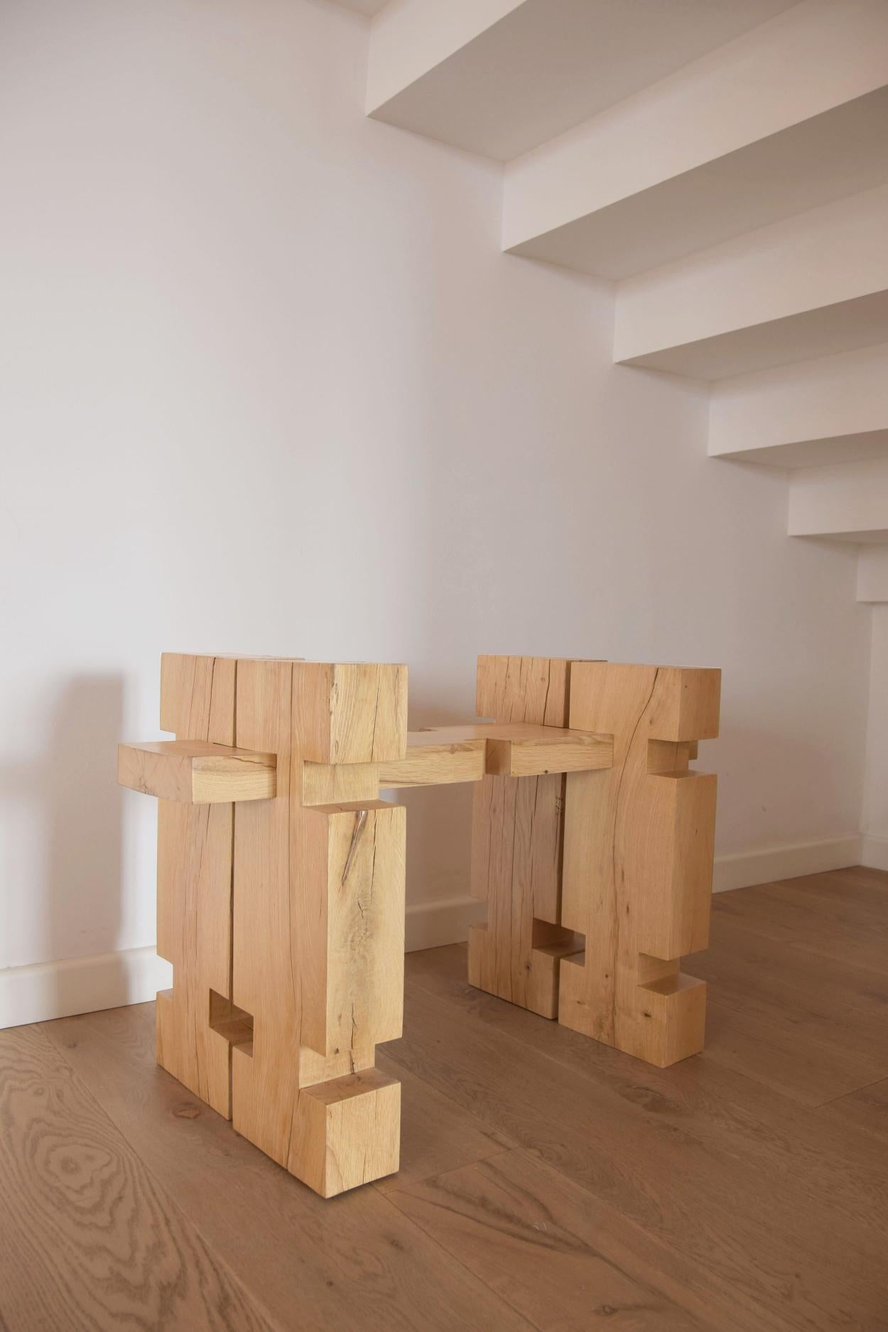 Element Bulk Stool by Nana Zaalishvili
Dimensions: W 85 x D 40 x H 55 cm
Materials: Century Old Oak

Made of solid oak, this 'Bulk' stool is one of the pieces of the ‘Element’ collection influenced by the Georgian Oda house and the architect Giorgi