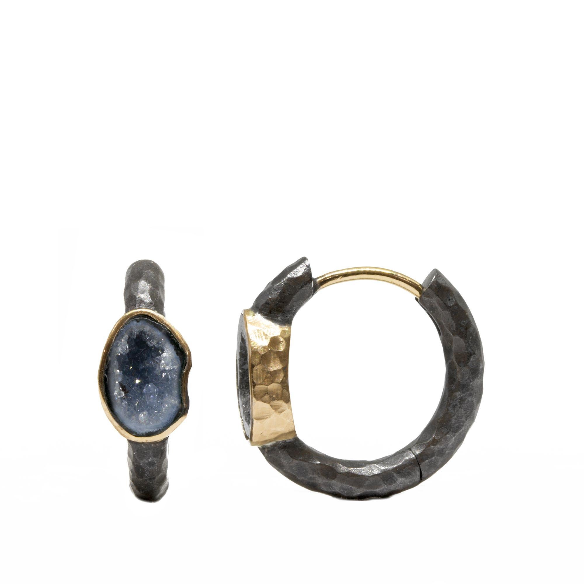 Made with textured blackened sterling silver and go-with-everything black geodes, the Element Mini Geode Silver Hoop Earrings are rock stars in every way. Each stone is set in an 18k gold bezel for a hint of contrast and shine. Add charms with an
