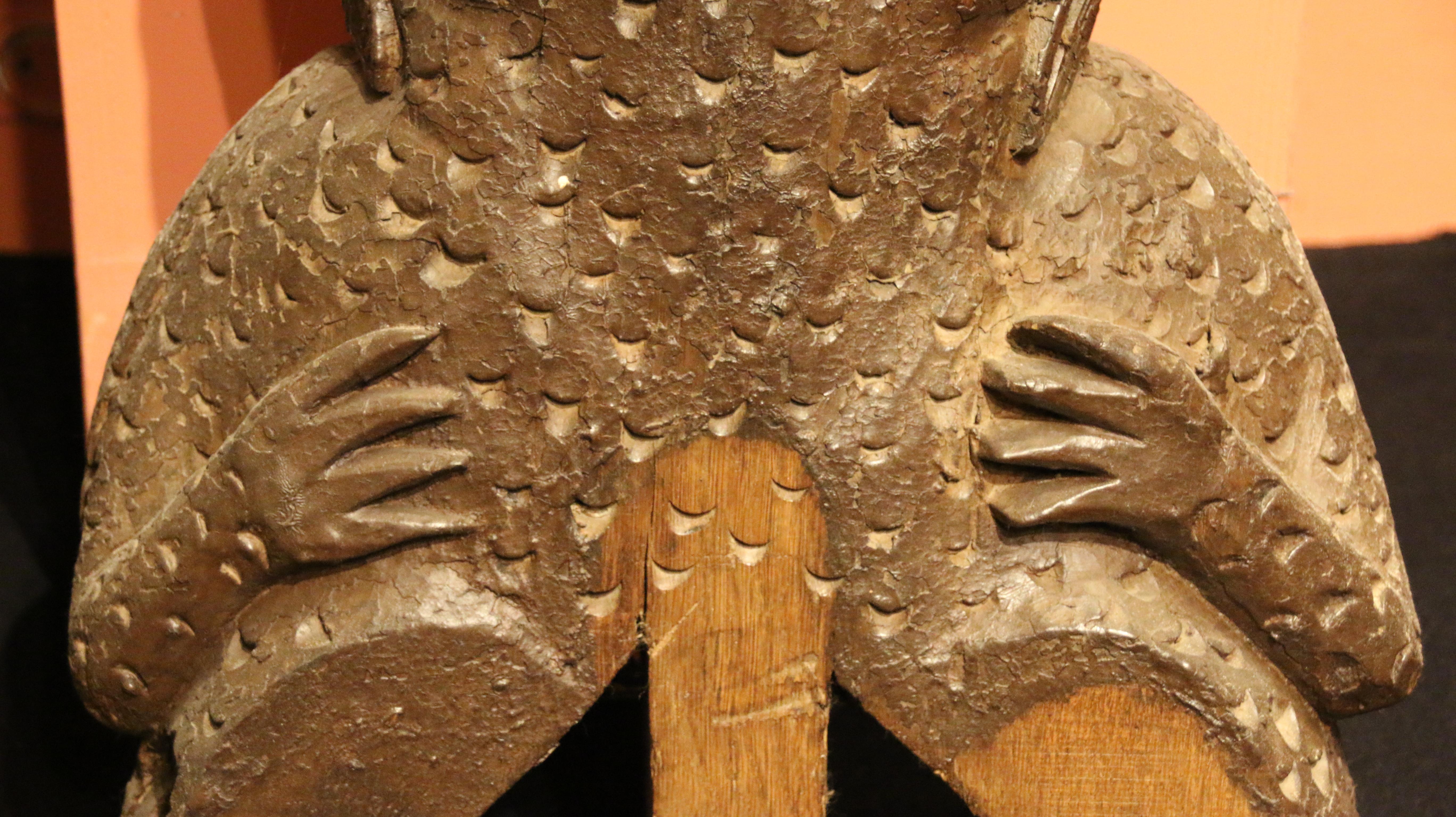 This carved oak woodwork was probably placed on the facade of the house, close to the roofing framework of a Norman house. The sculptor had depicted the salamender frontview in a stylised manner. The scales and the neck fringes are particularly