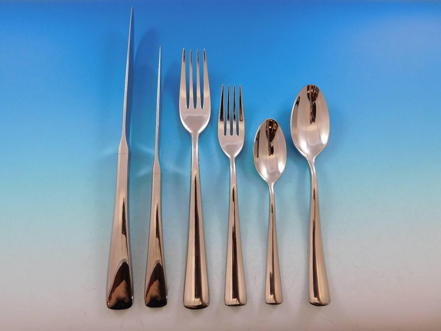 This brand new, still in the factory sleeves, Dinner Size stainless steel 83 piece flatware set for 12 in the pattern Elementaire by Christofle France includes:

    12 Dinner Size Knives, 9 1/2