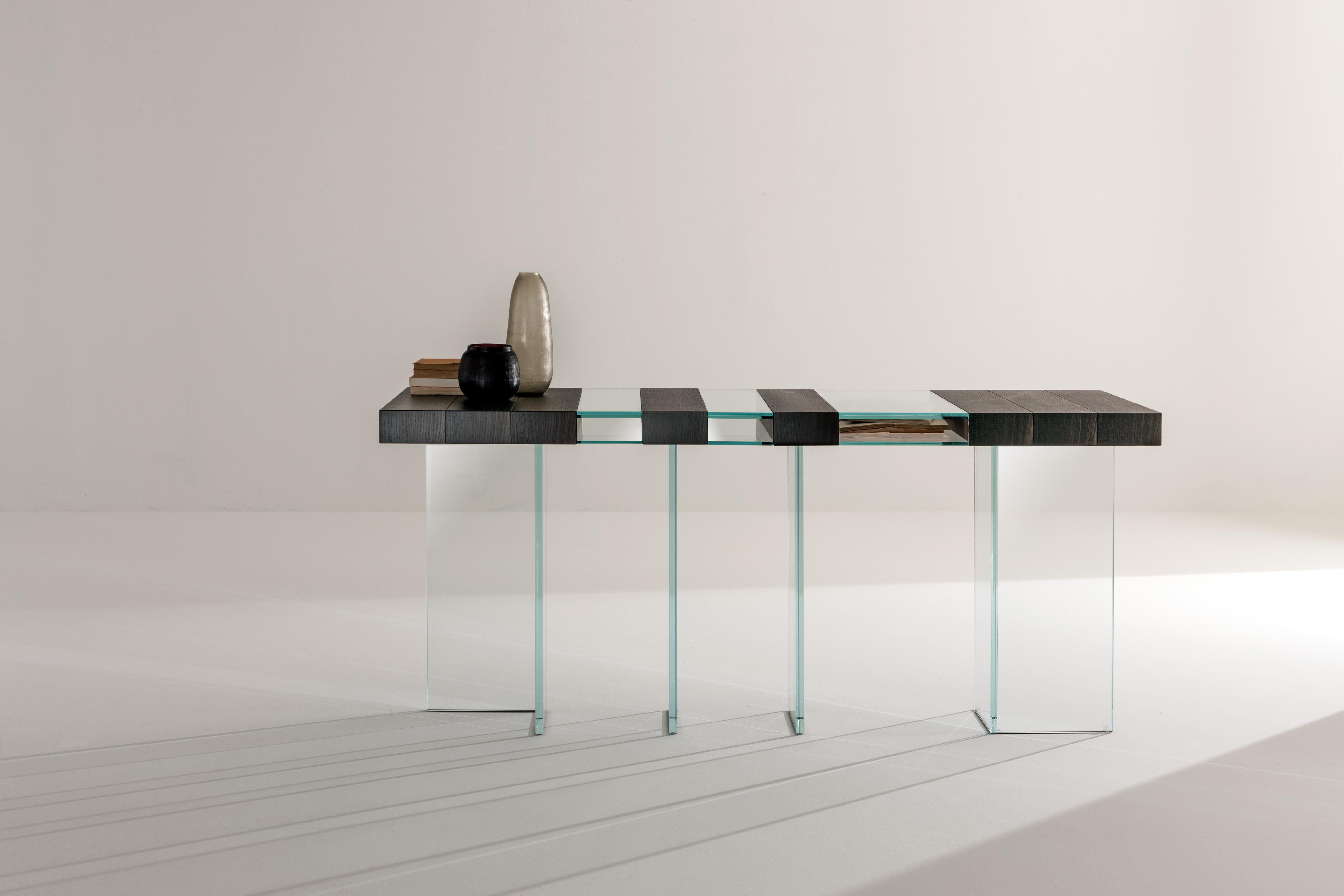 Elemento Console Table by Laurameroni
Dimensions: W 180 x D 50 x H 80 cm
Materials: Stone Oak Tabacco and extra‐clear crystal

Console with modules in Stone Oak wood and openable extra‐clear crystal cases. Extra‐clear crystal legs.

Laurameroni:
The