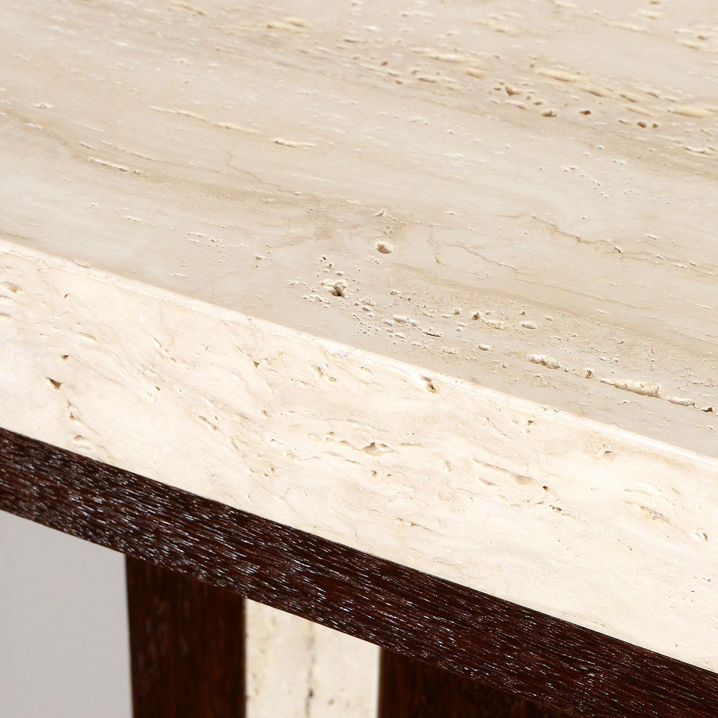 Marked by a bold T-shaped structure, this console table is where luminous Travertine stands in rich contrast with precious Sucupira wood veneer. The uniqueness both materials boast gets enhanced by the natural open-pore finish of Travertine and by