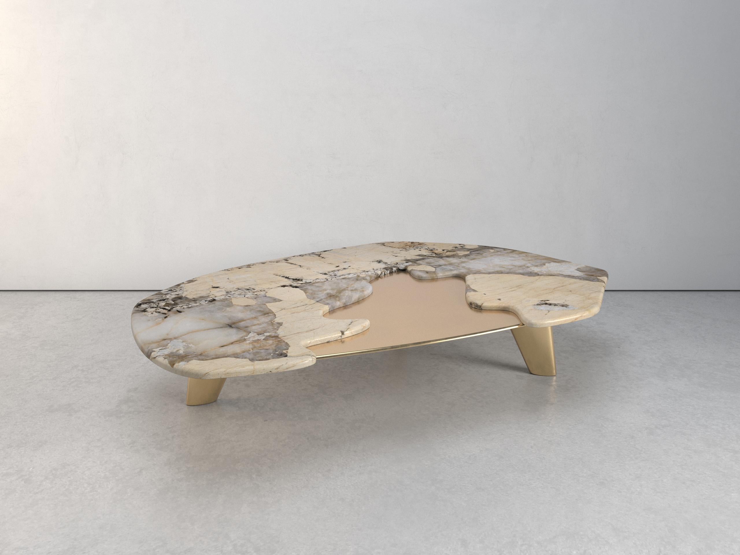The elements IV coffee table, 1 of 1 by Grzegorz Majka
Edition 1 of 1
Dimensions: 67 x 52 x 13 in.
Materials: solid brass. quartzite patagonia.


“The Elements IV” is one of a kind and one of the series of various coffee tables presented in