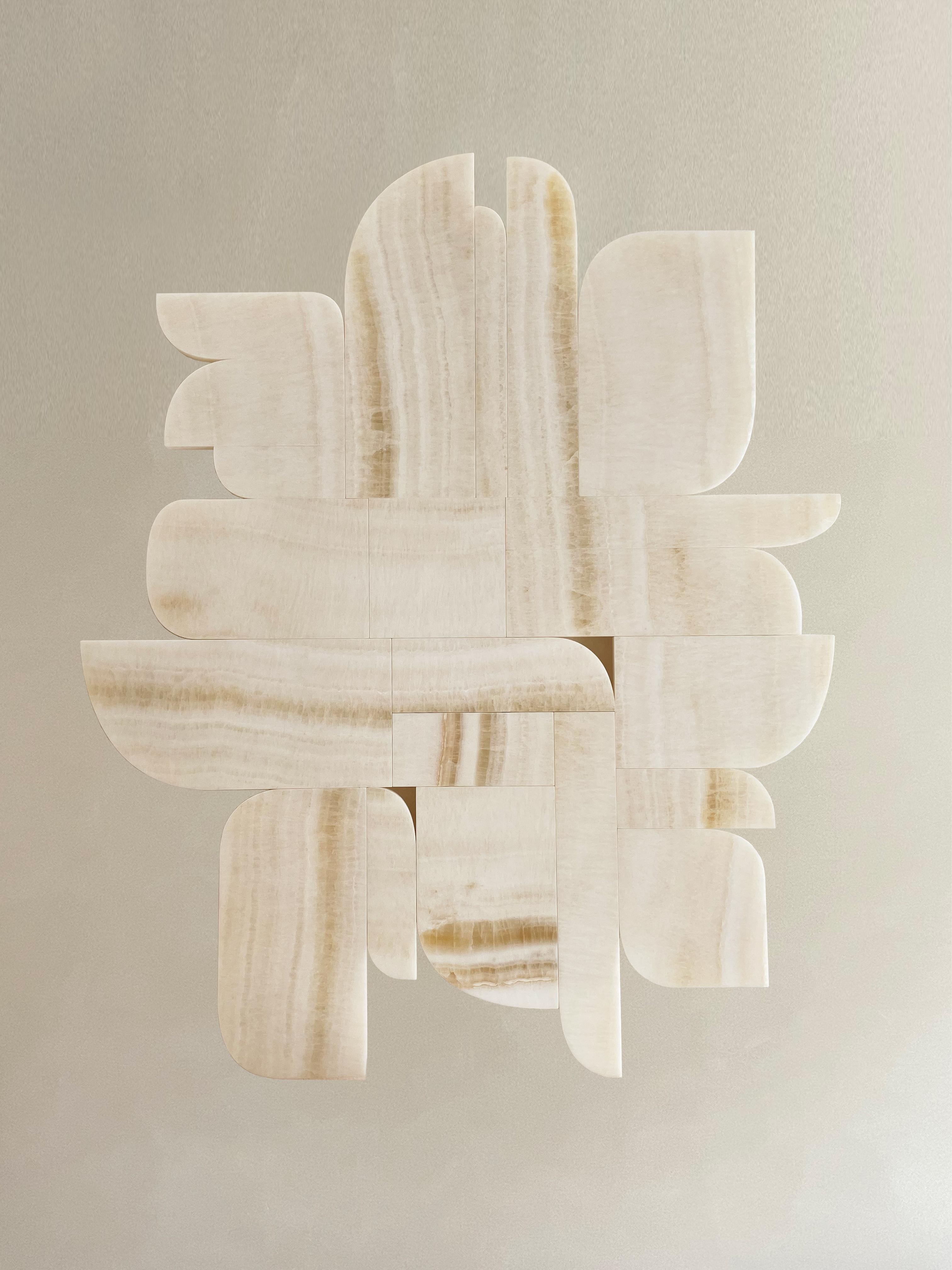 Sculpture murale Elements Stone n°001 d'Eline Baas
Dimensions : D 5 x L 100 x H 122 cm
MATERIAL : Yvory Onyx (massif). 

STUDIO ELINE BAAS est un studio de design d'intérieur basé à Amsterdam. 

Qu'il s'agisse d'une maison privée, d'un bureau, d'un