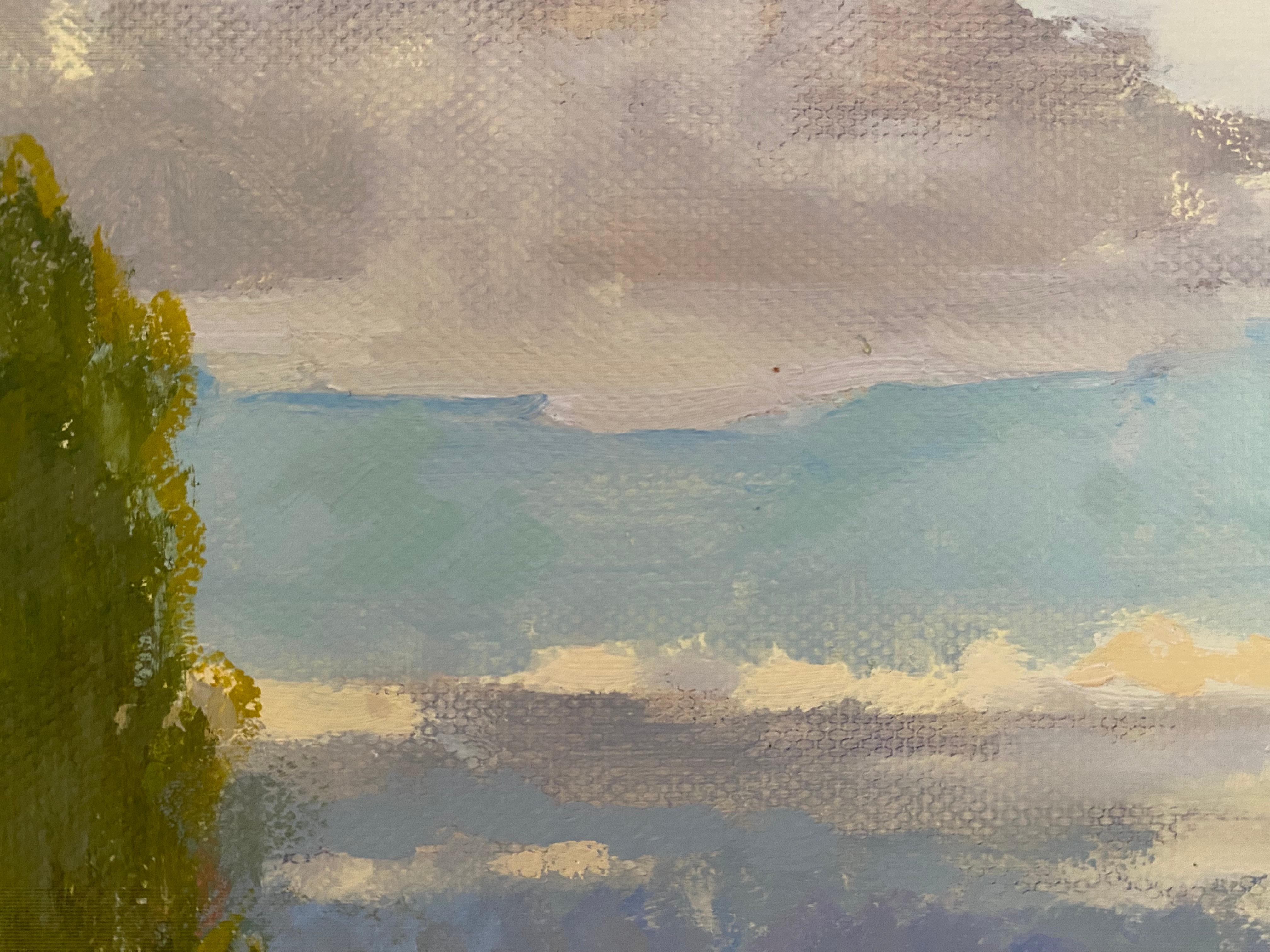 This plein air oil painting was created in Munich, Bavaria, inspired by the quiet charm of the local landscape. The artist captured the light breaking through the birch grove, the calm meadow, and the reflection of the sky in a small pond. The scene