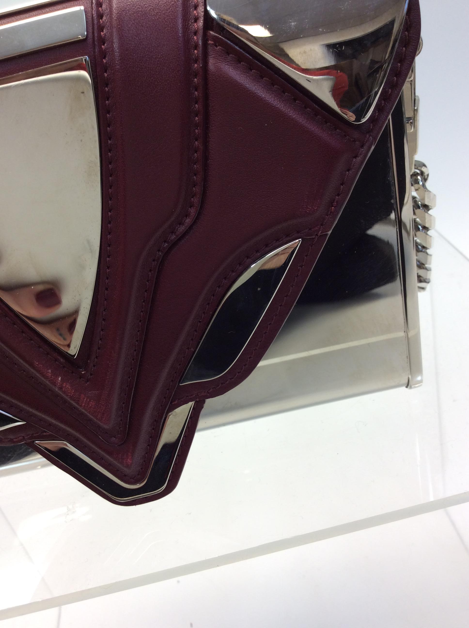 Women's Elena Ghisellini Metallic Silver and Burgundy Crossbody For Sale