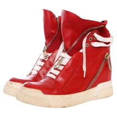 Elena Iachi, High-top sneakers in red leather.