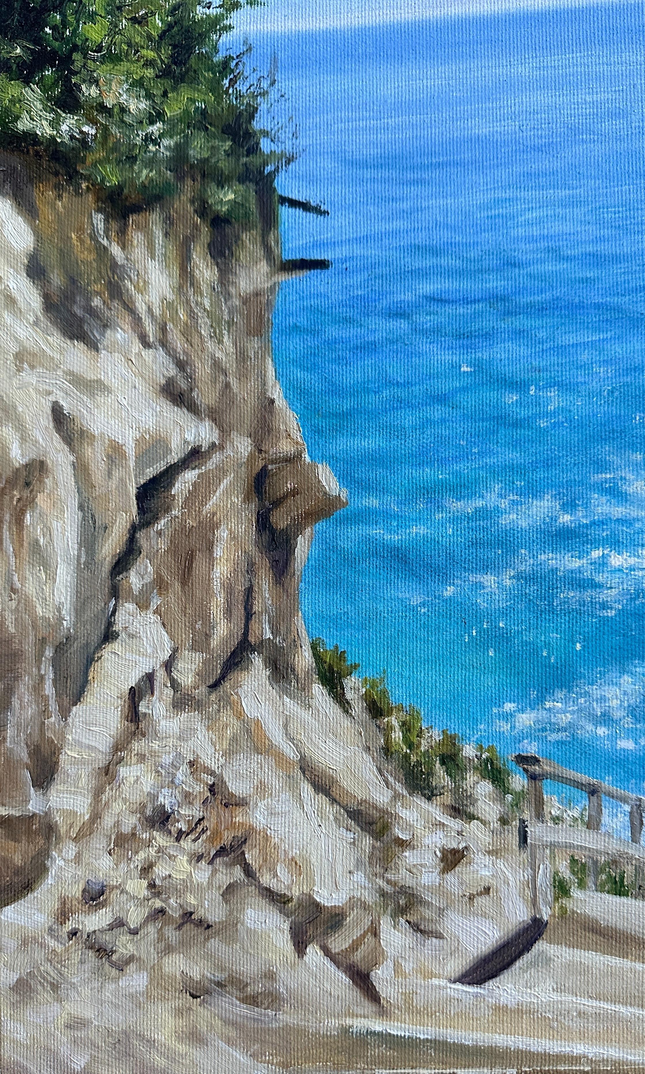 Zwischen zwei alten, von der Zeit geformten Klippen führt eine Treppe sanft zum Meer hinunter - ein Ort, an dem die Worte verstummen. Path to Silence ist mehr als eine Meereslandschaft; es ist eine innere Reise, eine visuelle Metapher für die