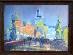 Evening lights of Prague. The Charles Bridge.