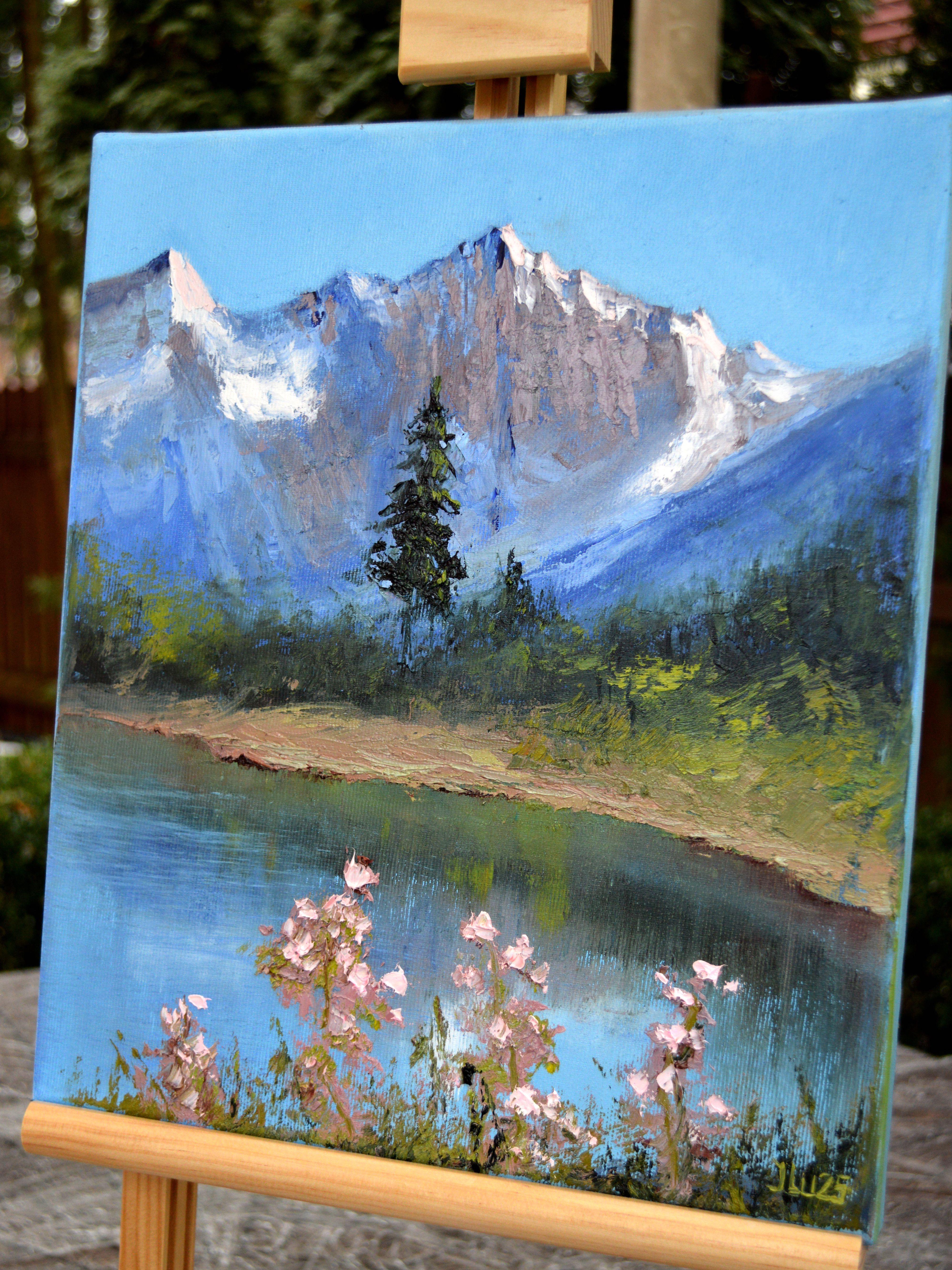 Dans cette peinture à l'huile vibrante, j'ai cherché à capturer la vitalité sereine d'un paysage de montagne juxtaposé à la beauté délicate de fleurs épanouies à sa base. Des coups de pinceau expressifs et une palette harmonieuse évoquent l'essence