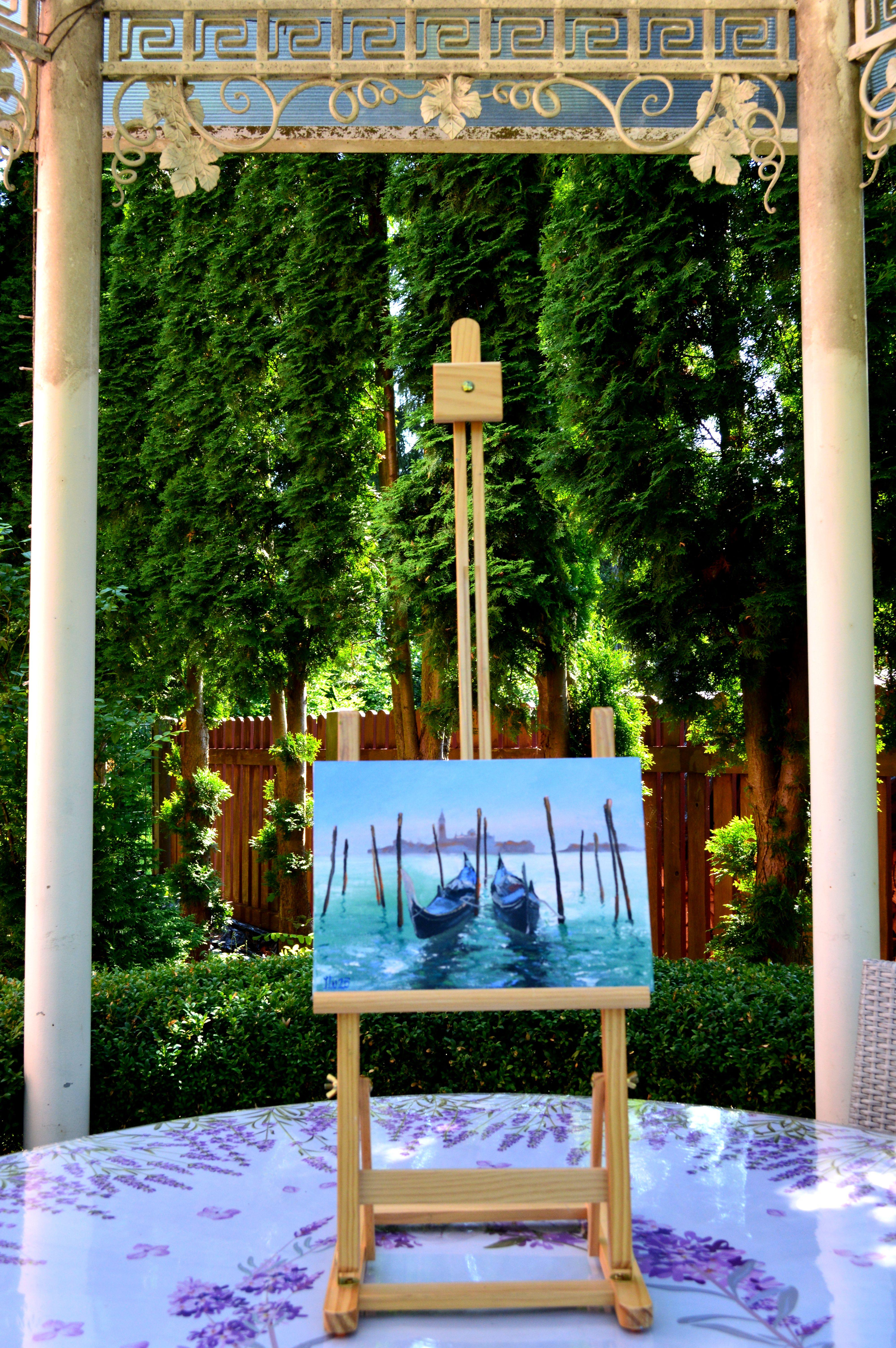 In this piece, I captured the serene embrace of Venetian gondolas floating gently at dawn. The interplay of light and water reflects a peaceful yet vibrant energy, inviting you to feel the calm flow of a quiet morning. This painting brings a soulful