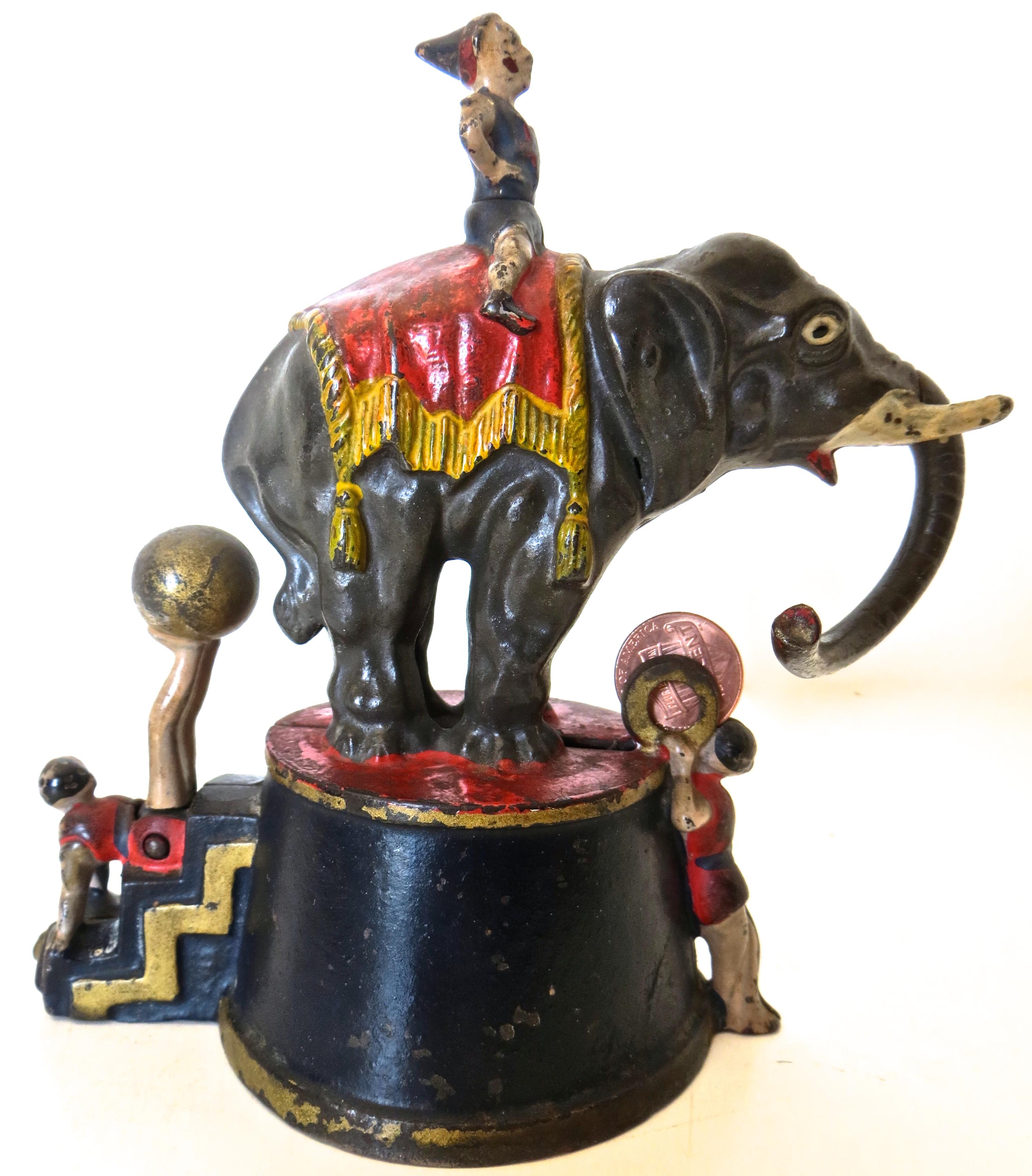 This is a highly desirable bank combining the rare trifecta of; action, subject matter, and universal shelf appeal.
“Elephant and Three Clowns” mechanical bank was manufactured by the Stevens Manufacturing Company, in Cromwell, Connecticut, circa
