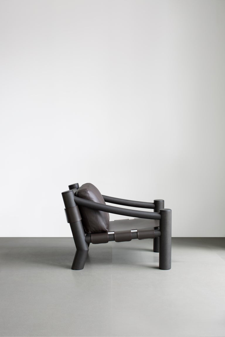 Clear lines and simple volumes are combined with fine cabinet-making in this iconic chair by Lebanese designer Karen Chekerdjian. Elephant’s base is made of turned solid wood, worked and polished to the touch. The frame is made of handcrafted