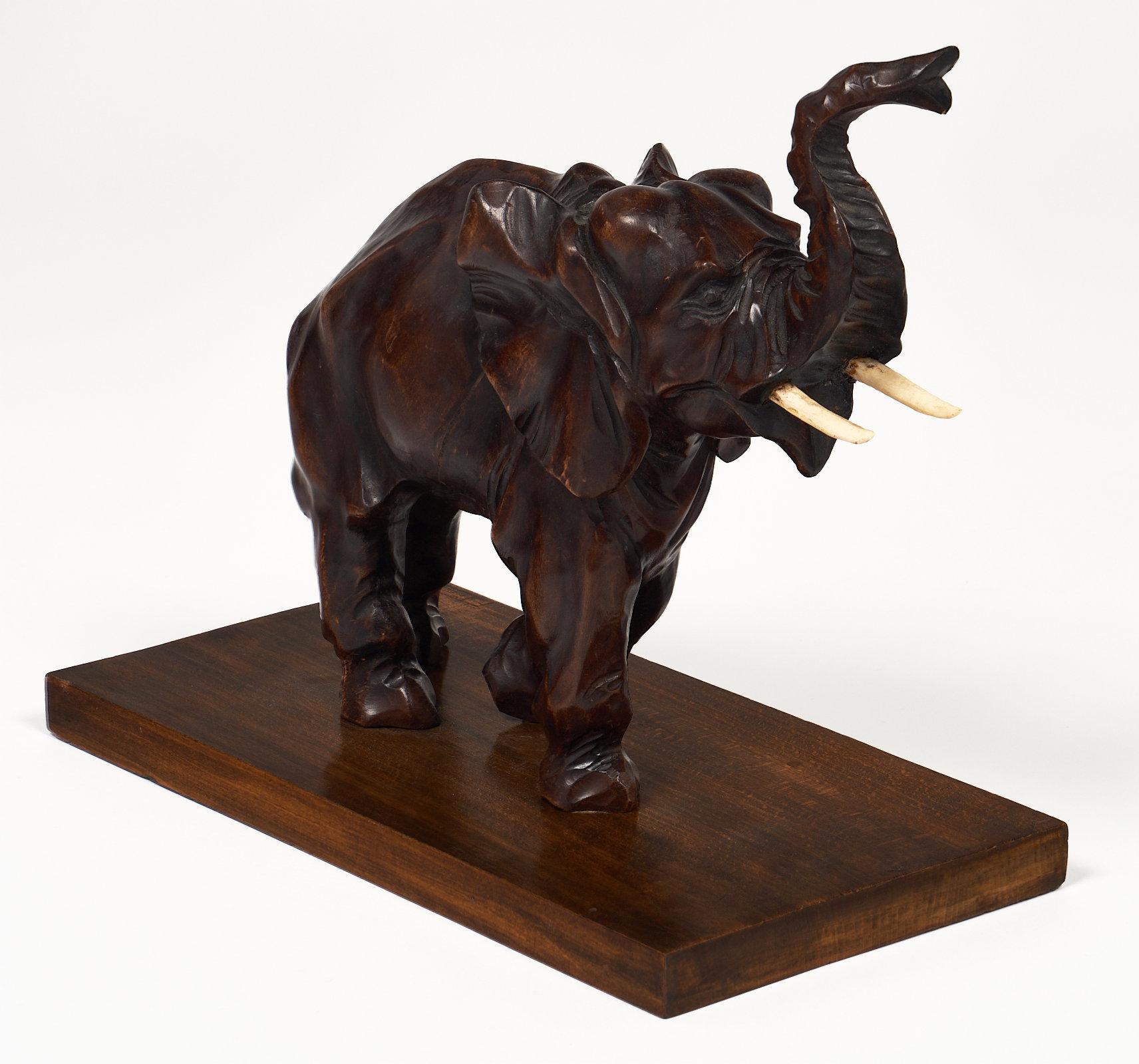 An Art Deco period elephant sculpture made of wood and detailing the elephant walking. We couldn’t resist the dynamic quality of the piece and the highly detailed form of the elephant. This piece has a wonderful quality and original patina.