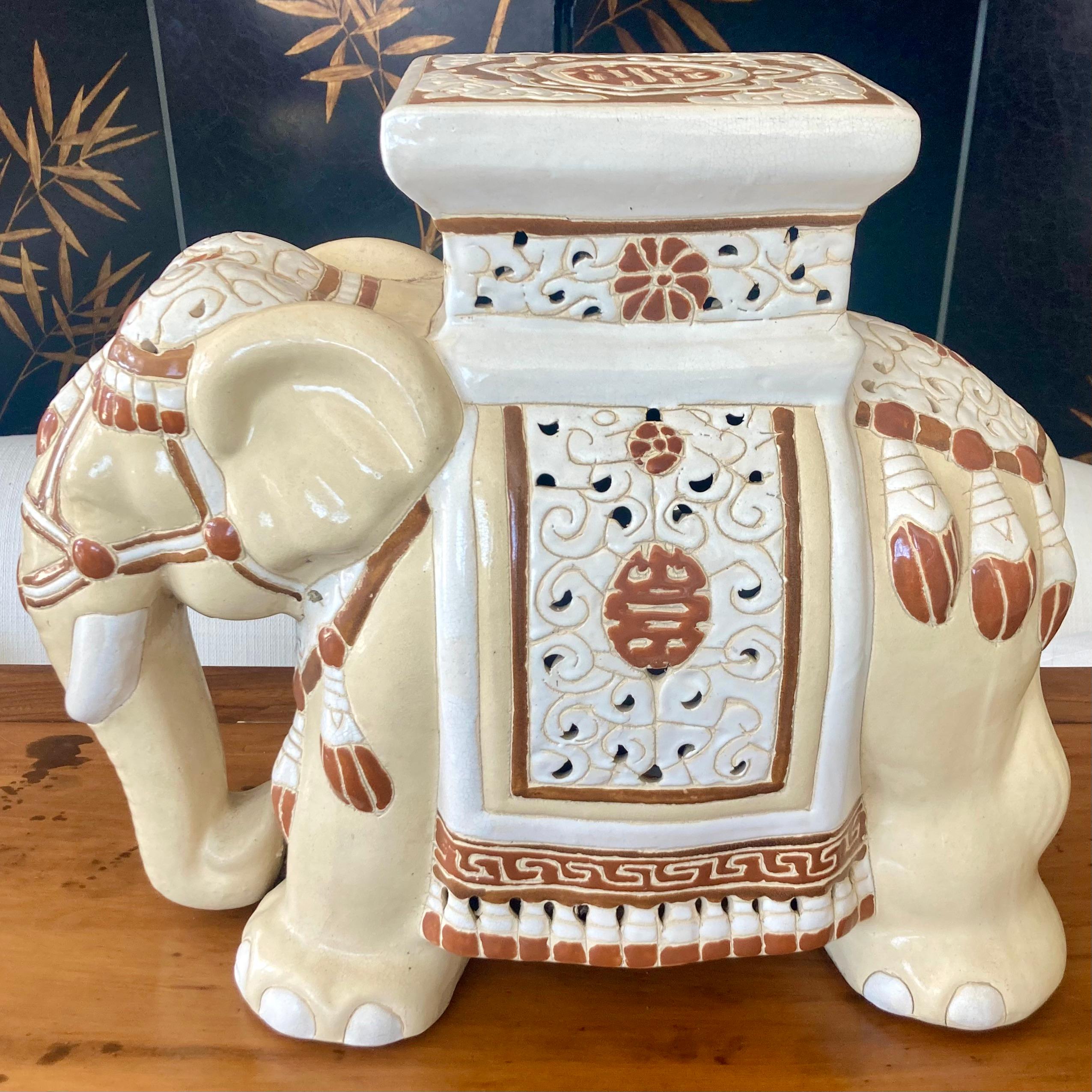 Elephant blanc and tan glazed ceramic glazed garden seat or cocktail table. Add some Boho Chic style to your design project.