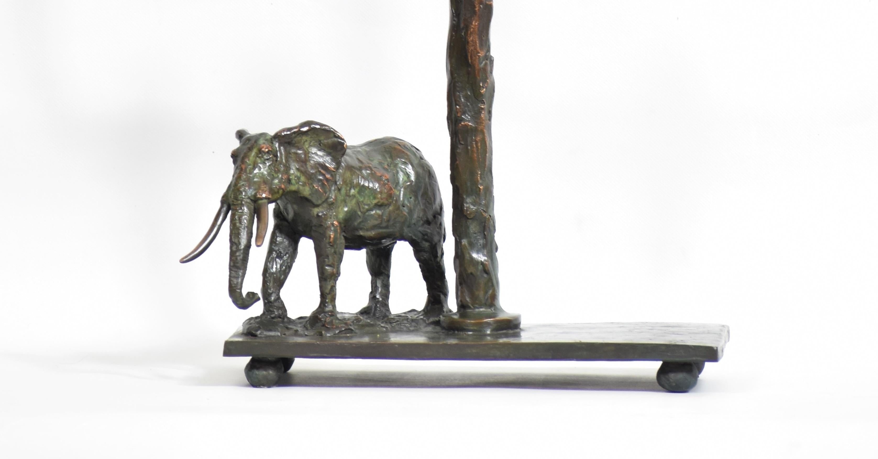 Rustic Elephant Candelabra in cast bronze featuring bronze sculpture of elephant bull For Sale