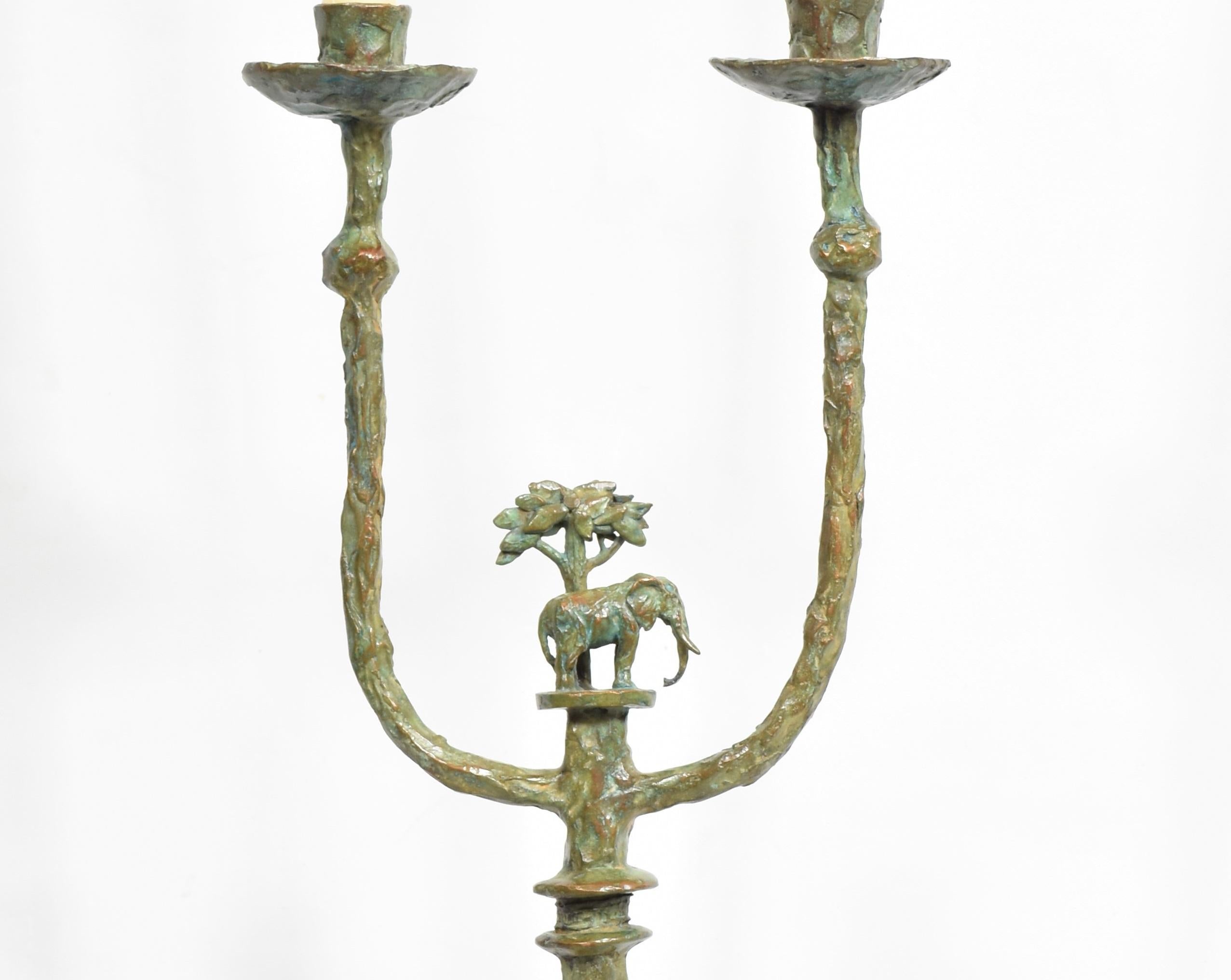 Unique and handmade functional art in cast bronze. Bronze candlestick with elephant and acacia tree motif with Brown Verdigris patina. Each piece is individually sculpted, cast and hand finished by myself. Each piece is very similar but still