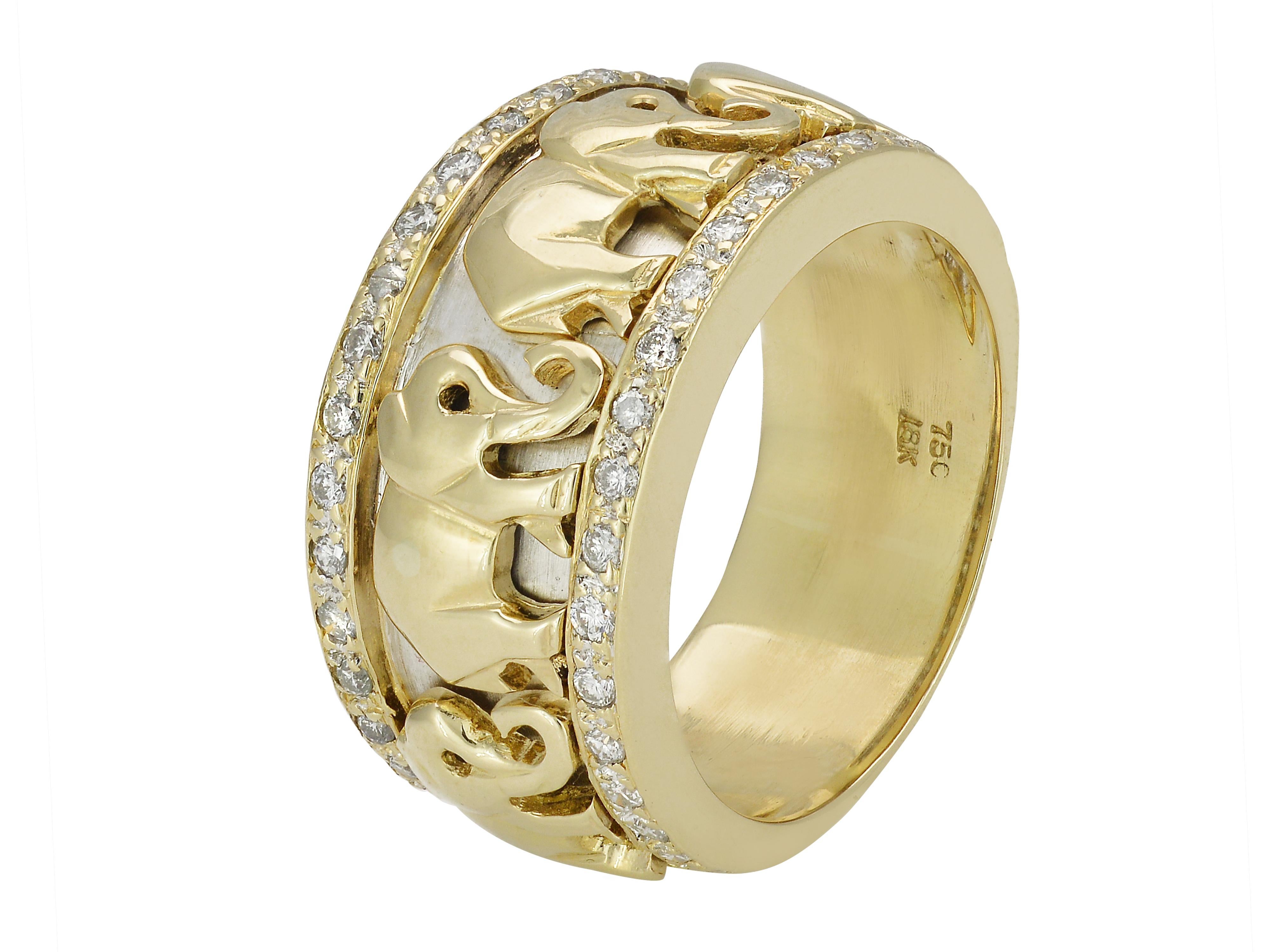 18 Karat Yellow Gold Ring Featuring A Line of Marching Elephants. The Wide Band Features 44 Round Diamonds Totaling Approximately 0.44 Carats of VS Clarity & H Color. Width at the Top is 12mm; Bottom Width is 9.5mm. Finger Size 8; Purchase Includes