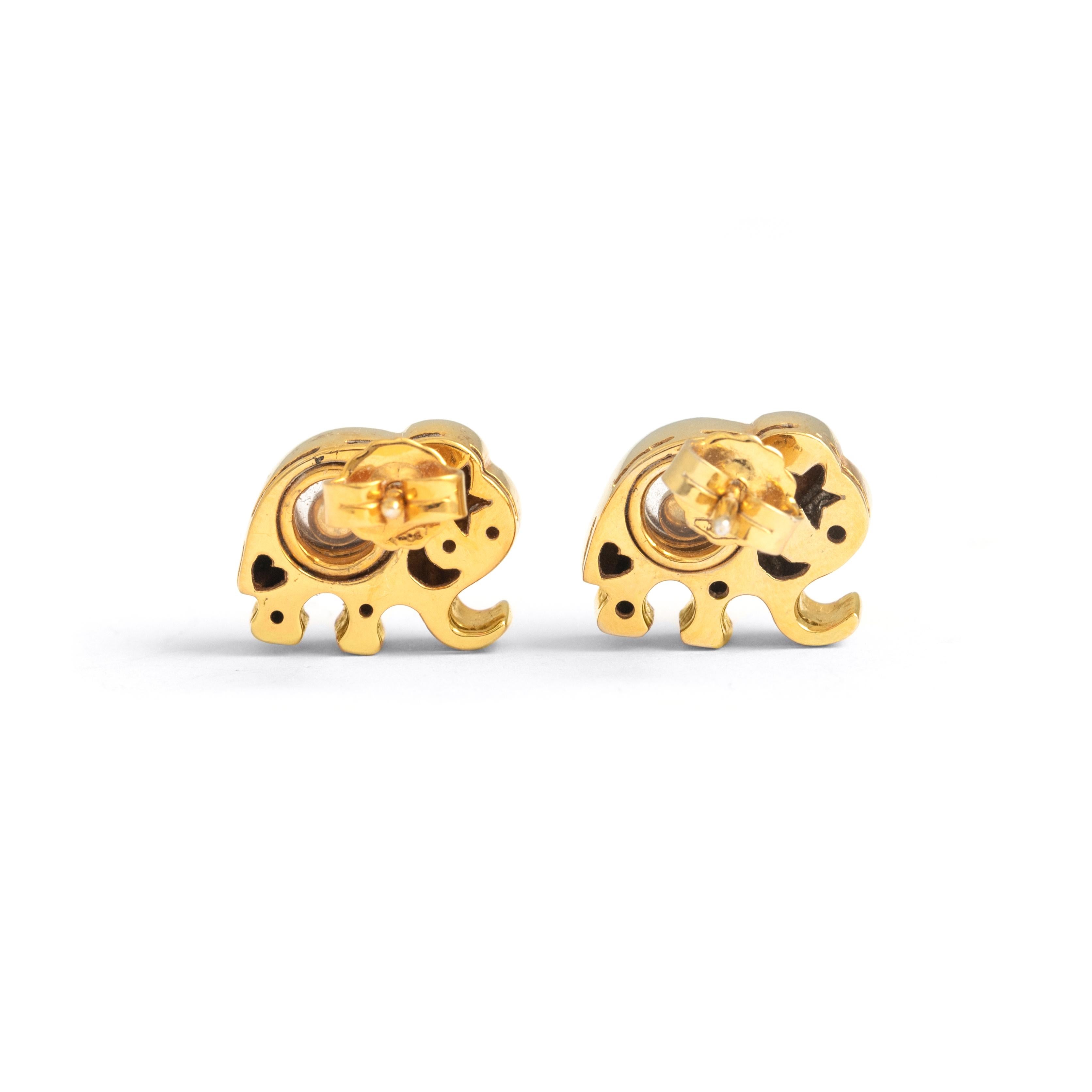 Elephant design, Diamond on Yellow Gold 18K Earrings.
Dancing diamonds gently moving and twirling between two crystals.
Size: 1.40 centimeters x 1.20 centimeters.

Total weight: 9.57 grams.
