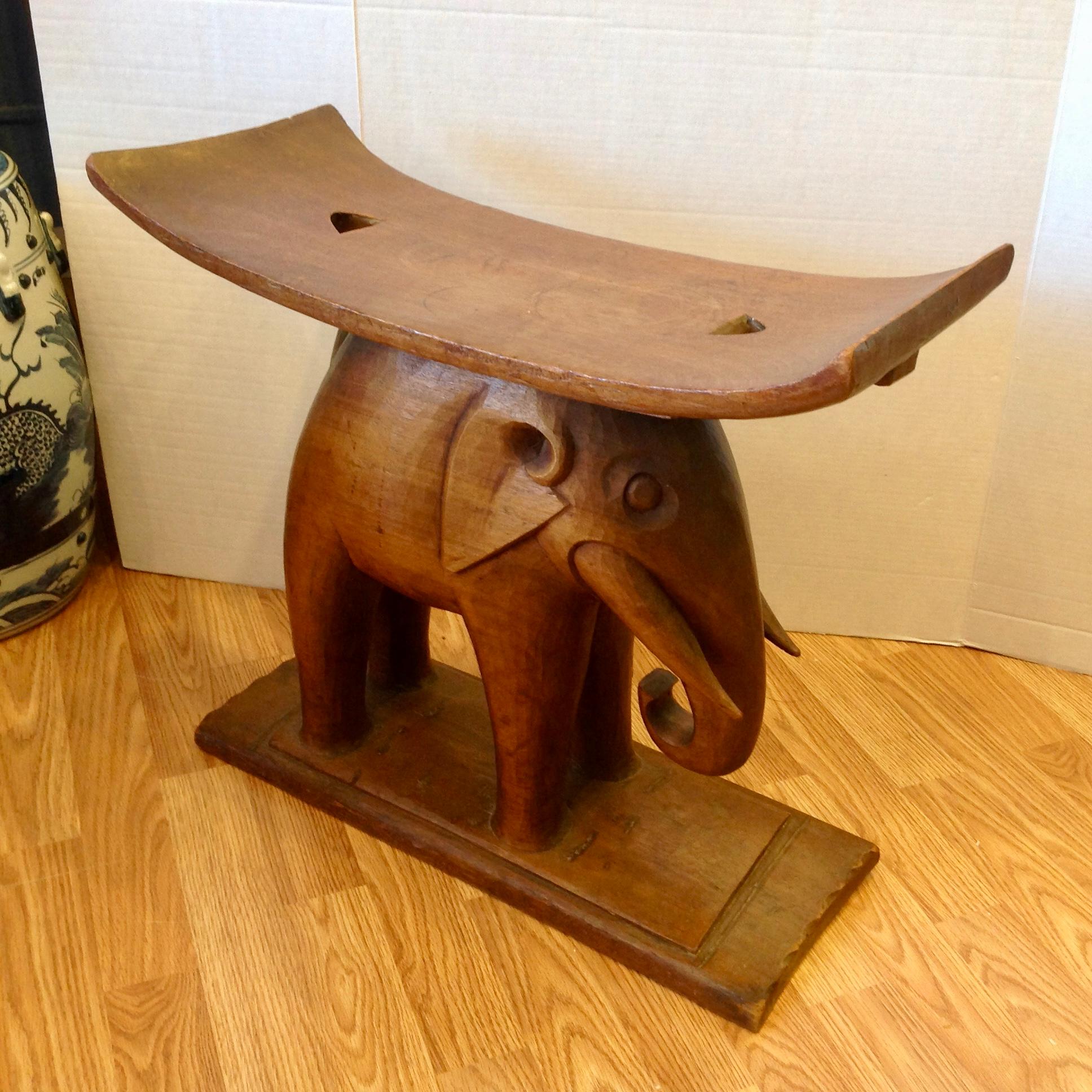The elephant is carved from a single piece of wood - a Classic form.
Nicely proportioned and stylized.