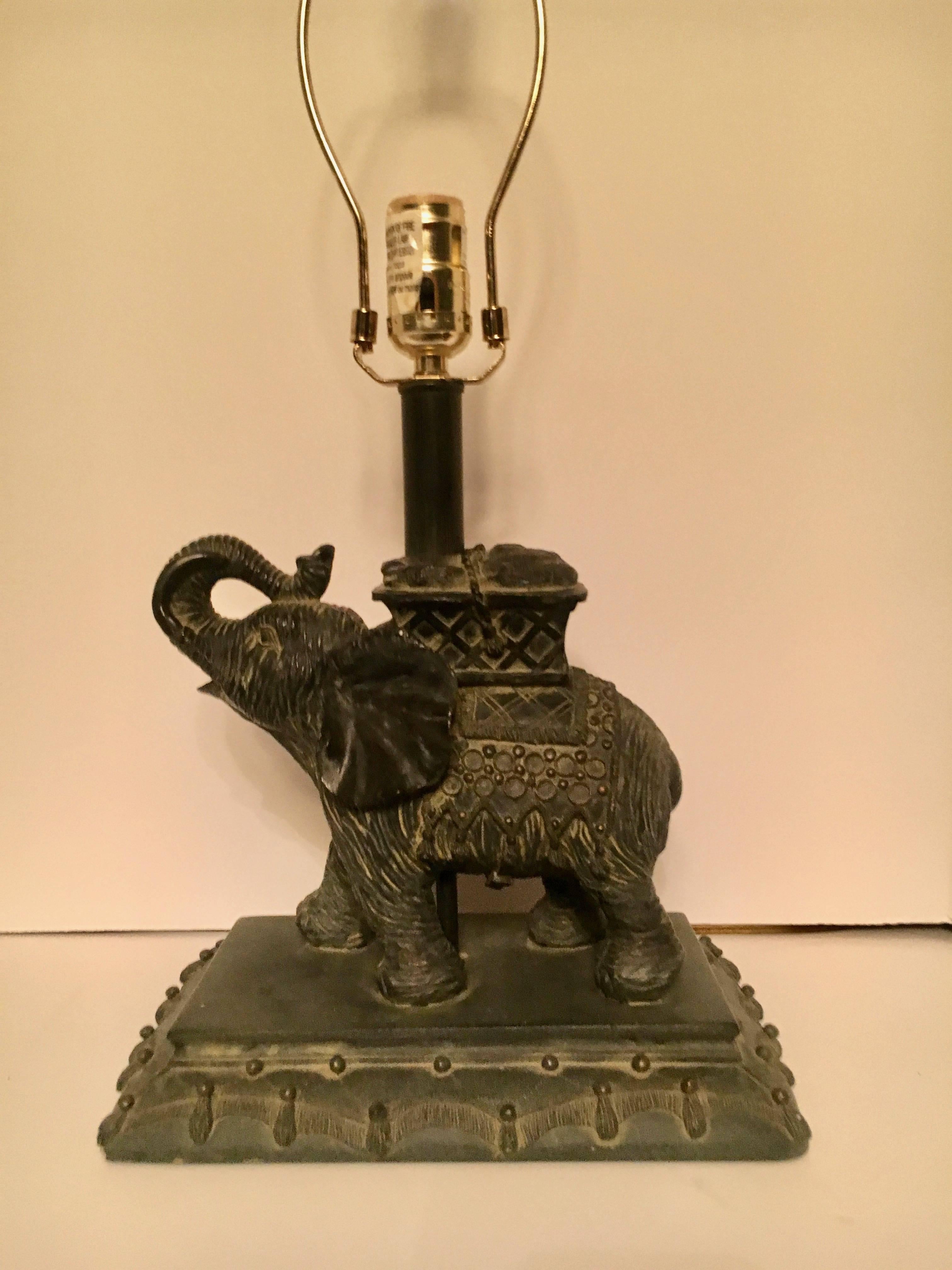 Resin elephant lamp. A compliment to any room specially to a child's room. Finial included but no lampshade.