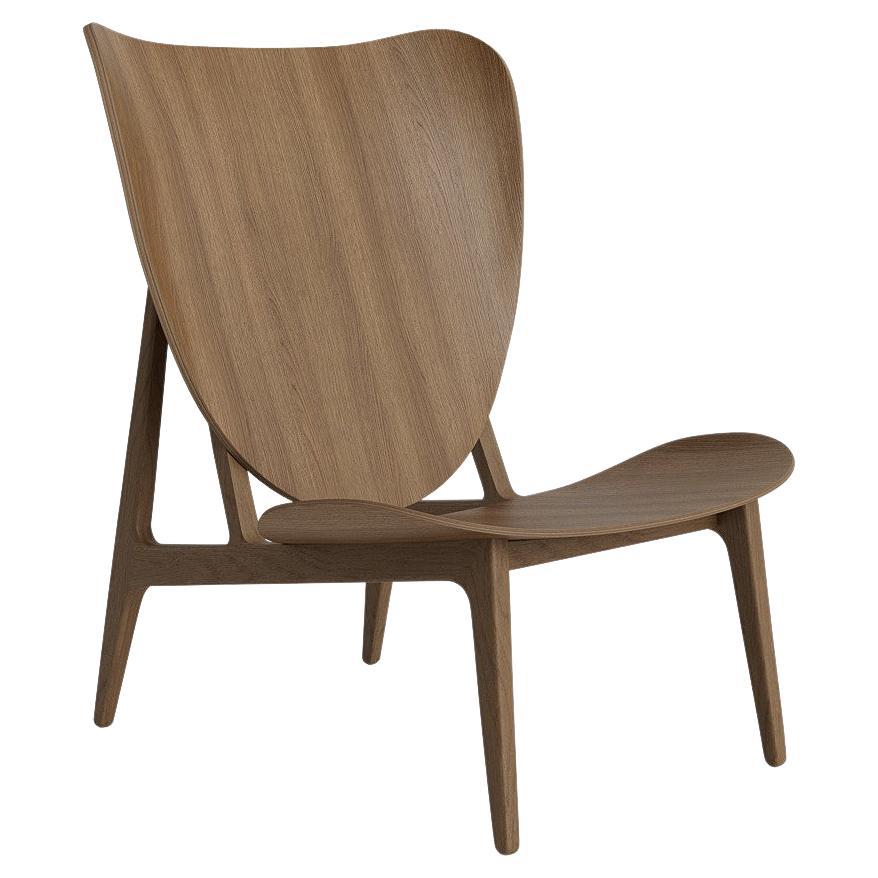 Elephant Lounge Chair by NORR11
Dimensions: D 75 x W 80 x H 96 cm. SH 38 cm. 
Materials: Dark smoked oak.

Available in different oak finishes: Natural oak, light smoked oak, dark smoked oak, black oak. Also available in different upholstery