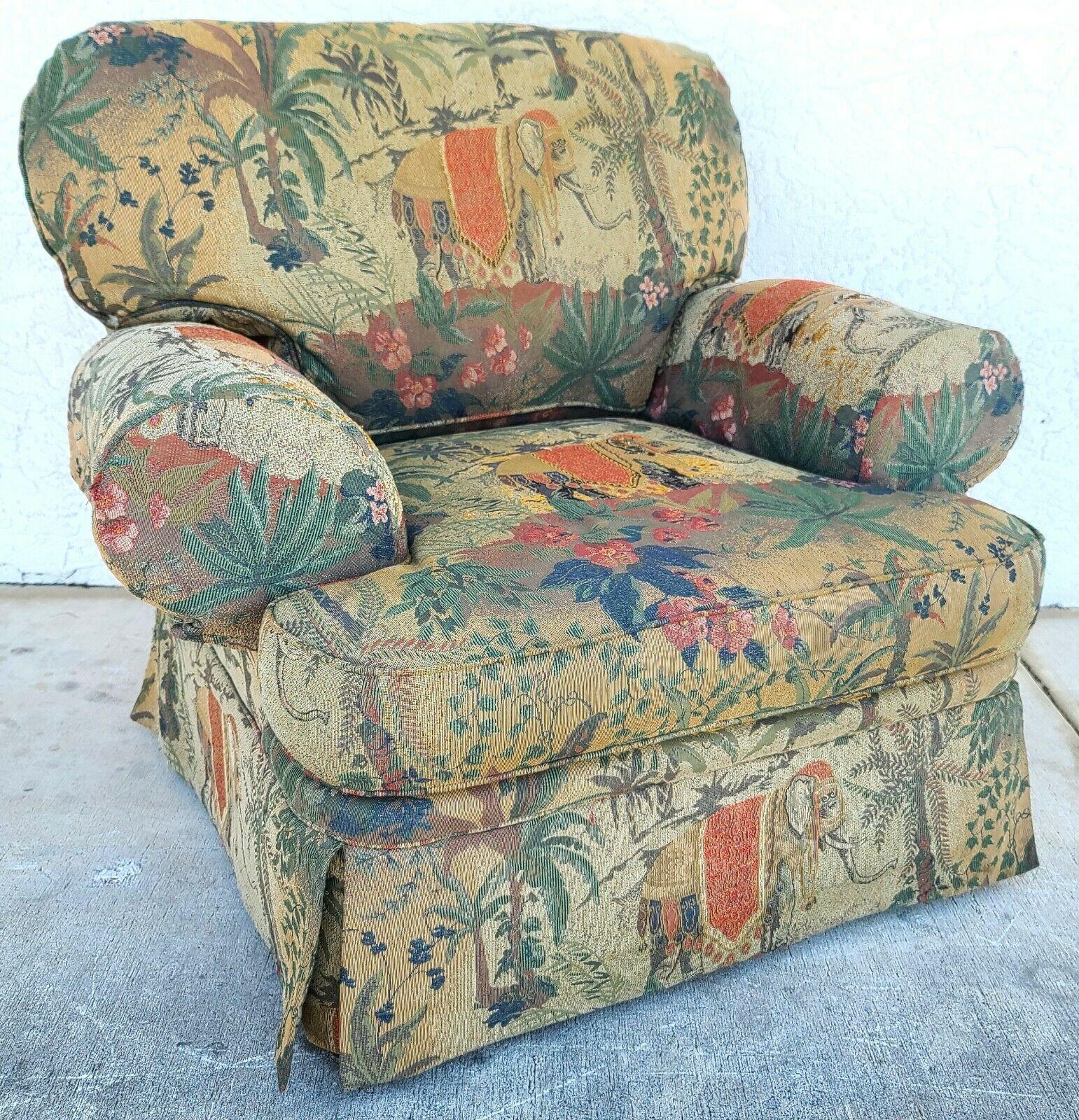 Offering one of our recent palm beach estate fine furniture acquisitions of an 
English style elephant lounge chair & ottoman by Michael Thomas
Includes 2 matching throw pillows and comes with 2 arm covers and is very comfortable.
The fabric has