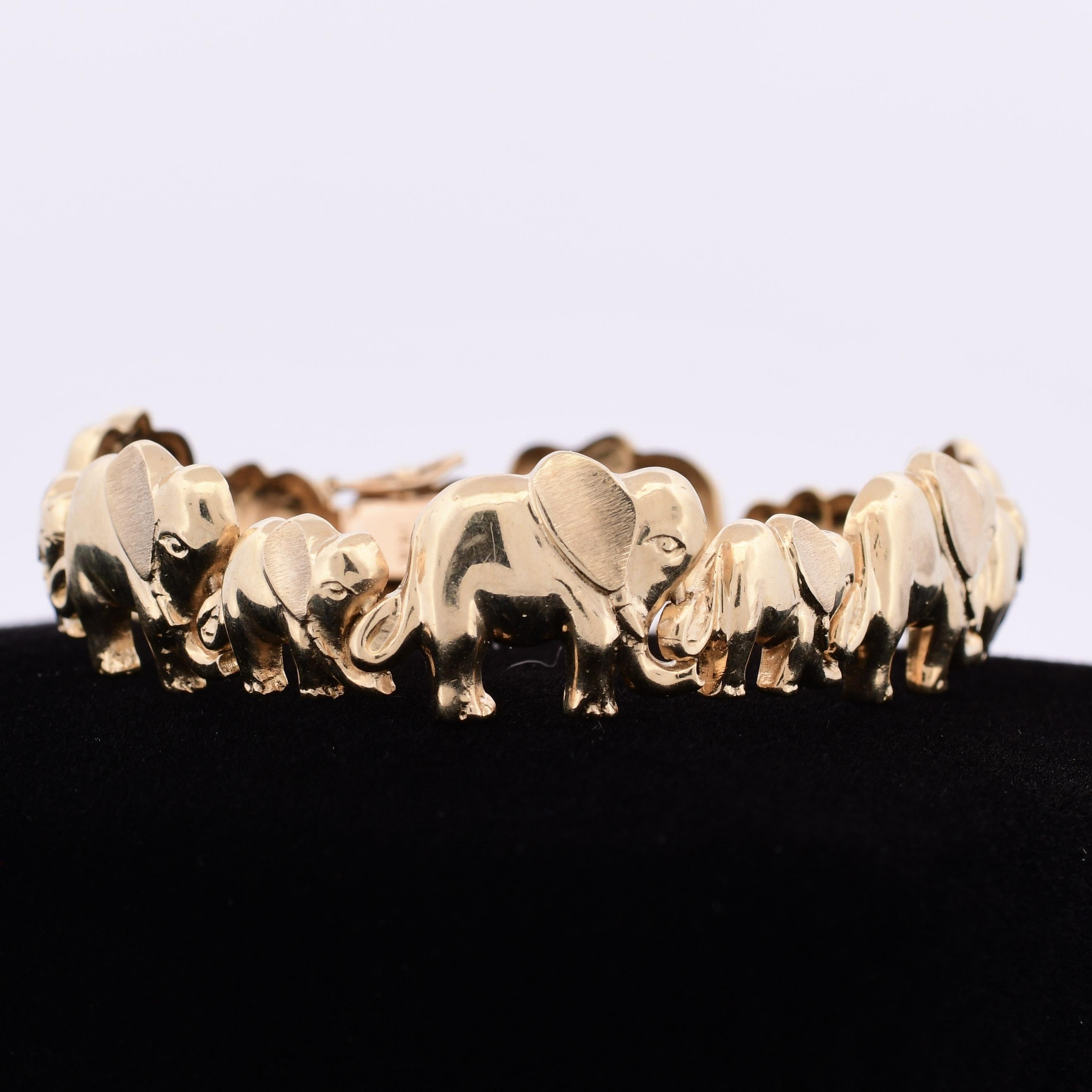Transport yourself to the early 2000s with this enchanting 14K Elephant Mother and Baby repeated bracelet. Crafted with meticulous detail, this vintage piece captures the essence of maternal love and the intricate bond between mother and child