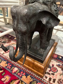 Elephant Motif Iron & Bevelled Glass End Table by Maitland Smith