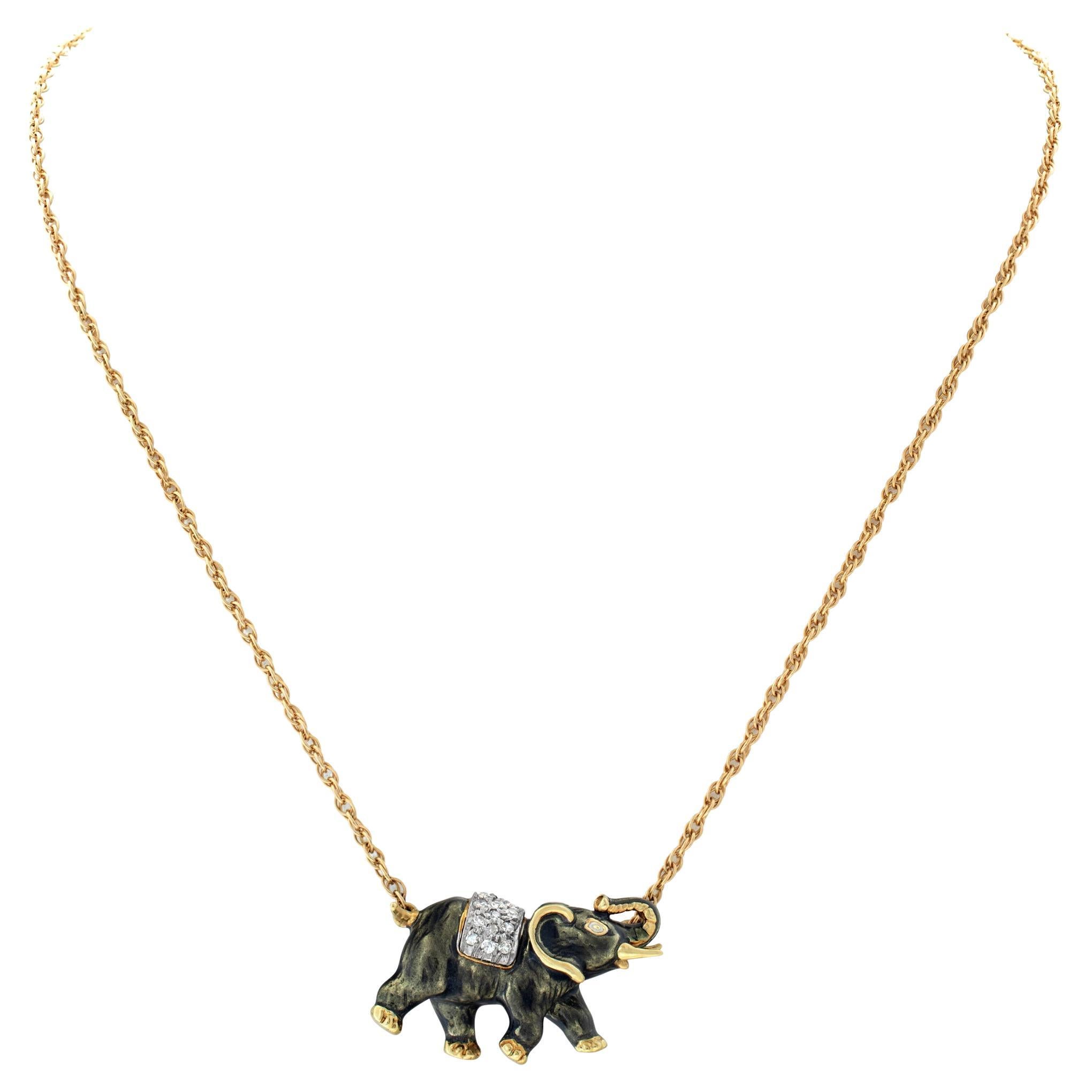 Elephant necklace in 14k gold with 0.25 carats in diamond accents G-H color, For Sale