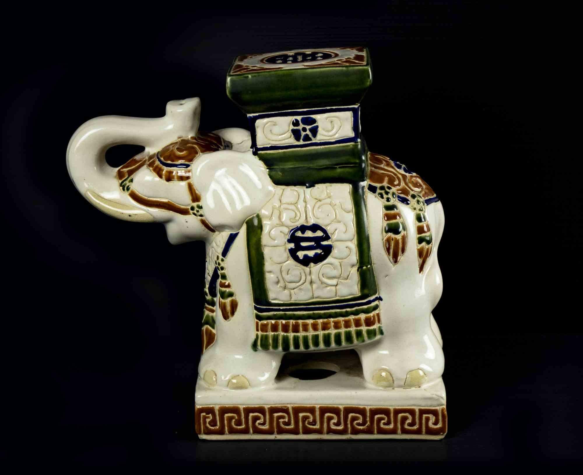 Good luck Elephant is an original decorative object realized in the 1970s.

An ornamental object realized in colored ceramic.

Good overall conditions except for some lack of colors on the ceramic surface. 

Elephant imagery in the home