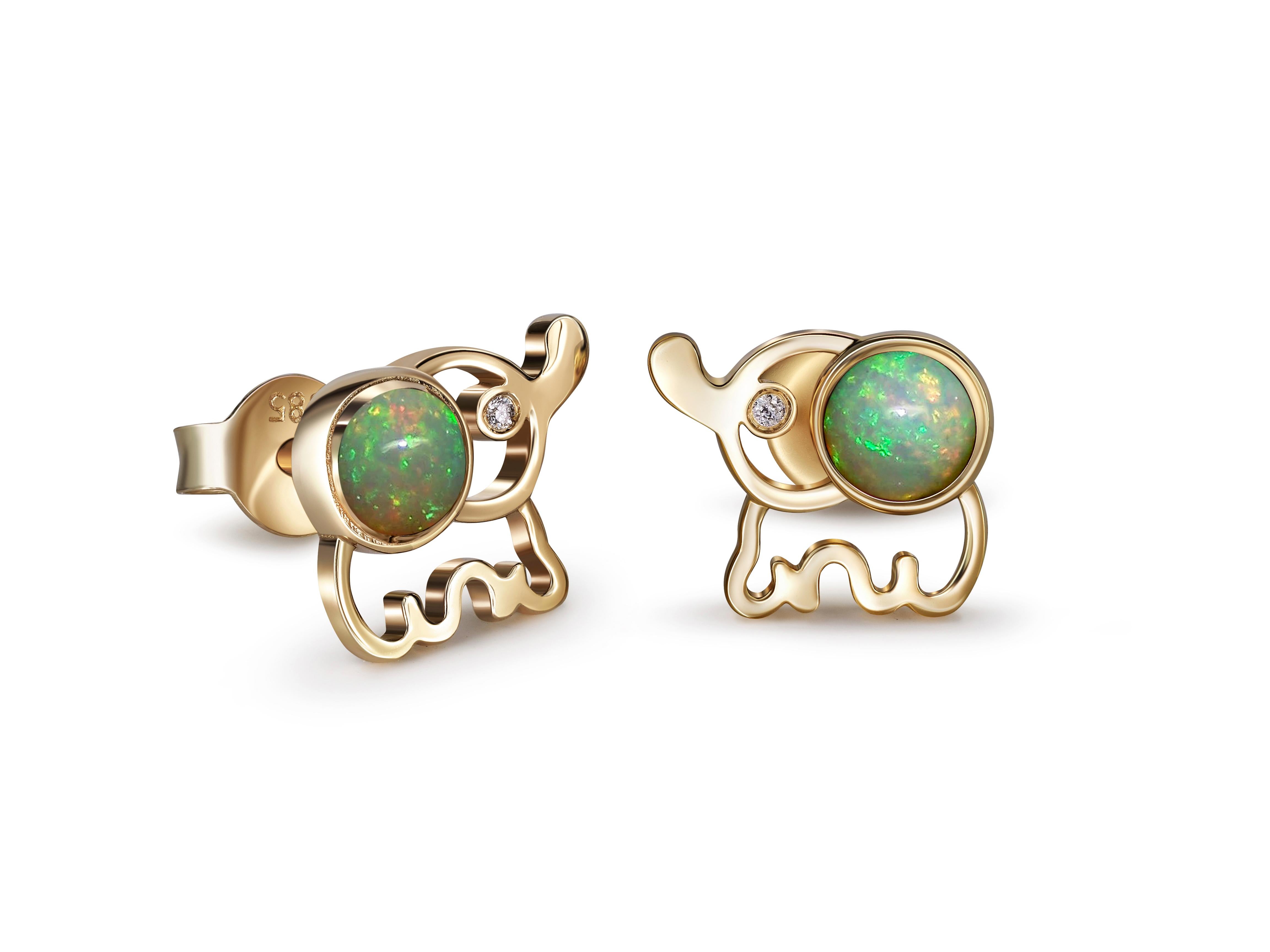 Modern Elephant Opal 14k gold earrings studs.  For Sale