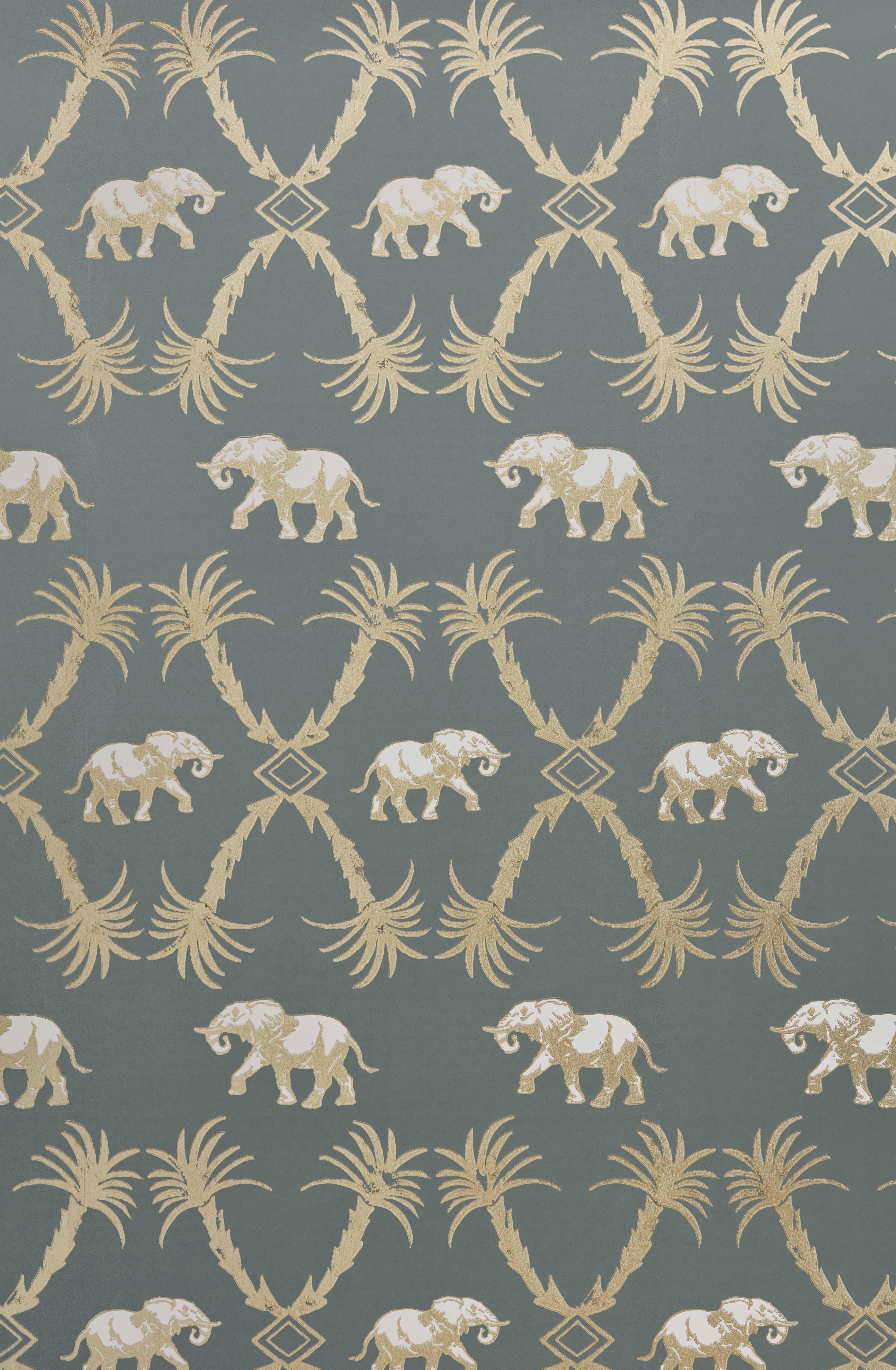 Color: Gunmetal/gold (also available in ochre/blue)
Measures: Trim width 52cm/20.5 inches
Roll length 10m
Pattern repeat Straight match
Match length 52cm/20.5 inches

A colonial inspired trellis of palm trees and marching elephants, available