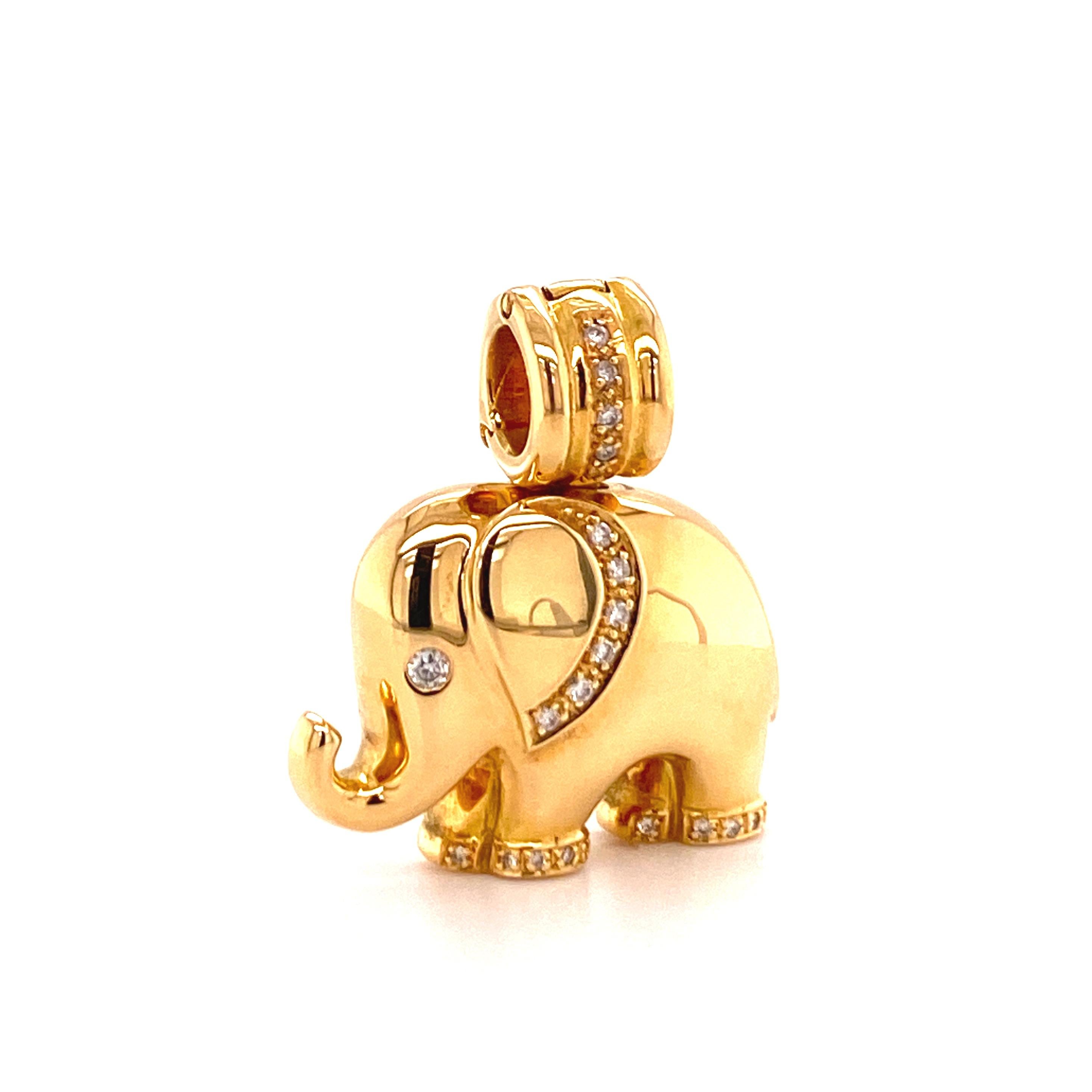 This beautifully curved and shaped elephant pendant in 18 karat yellow gold is set with 22 brilliant-cut diamonds of G/H colour and vs/si clarity, total weight approximately 0.19 carats.

The eyelet can be opened so that the pendant fits on chains