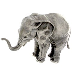 Sculpture d'éléphant coquelicot en argent