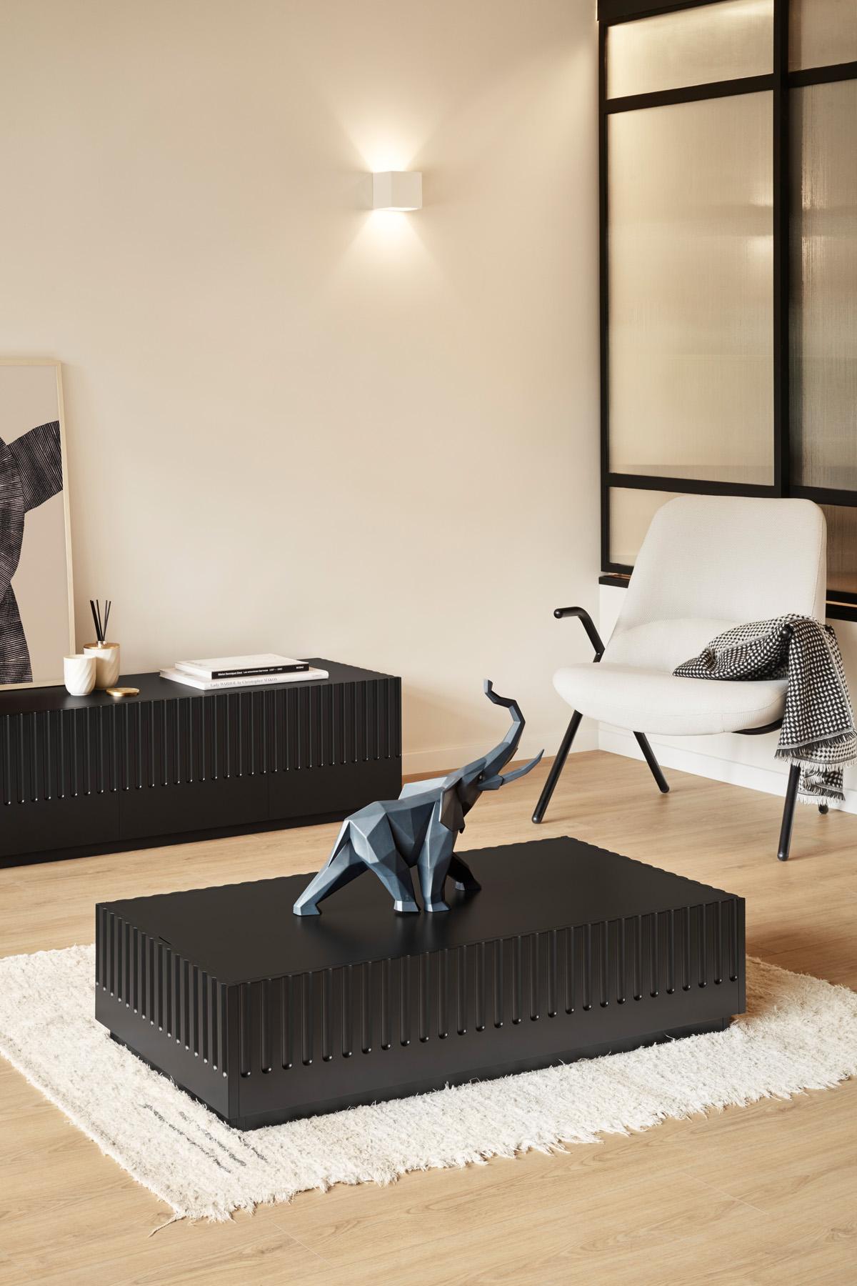 Matte black porcelain creation inspired by an African elephant from the Origami collection. This striking African elephant is the latest addition to the Origami collection. When it is depicted with its trunk pointed upwards, this animal symbolizes