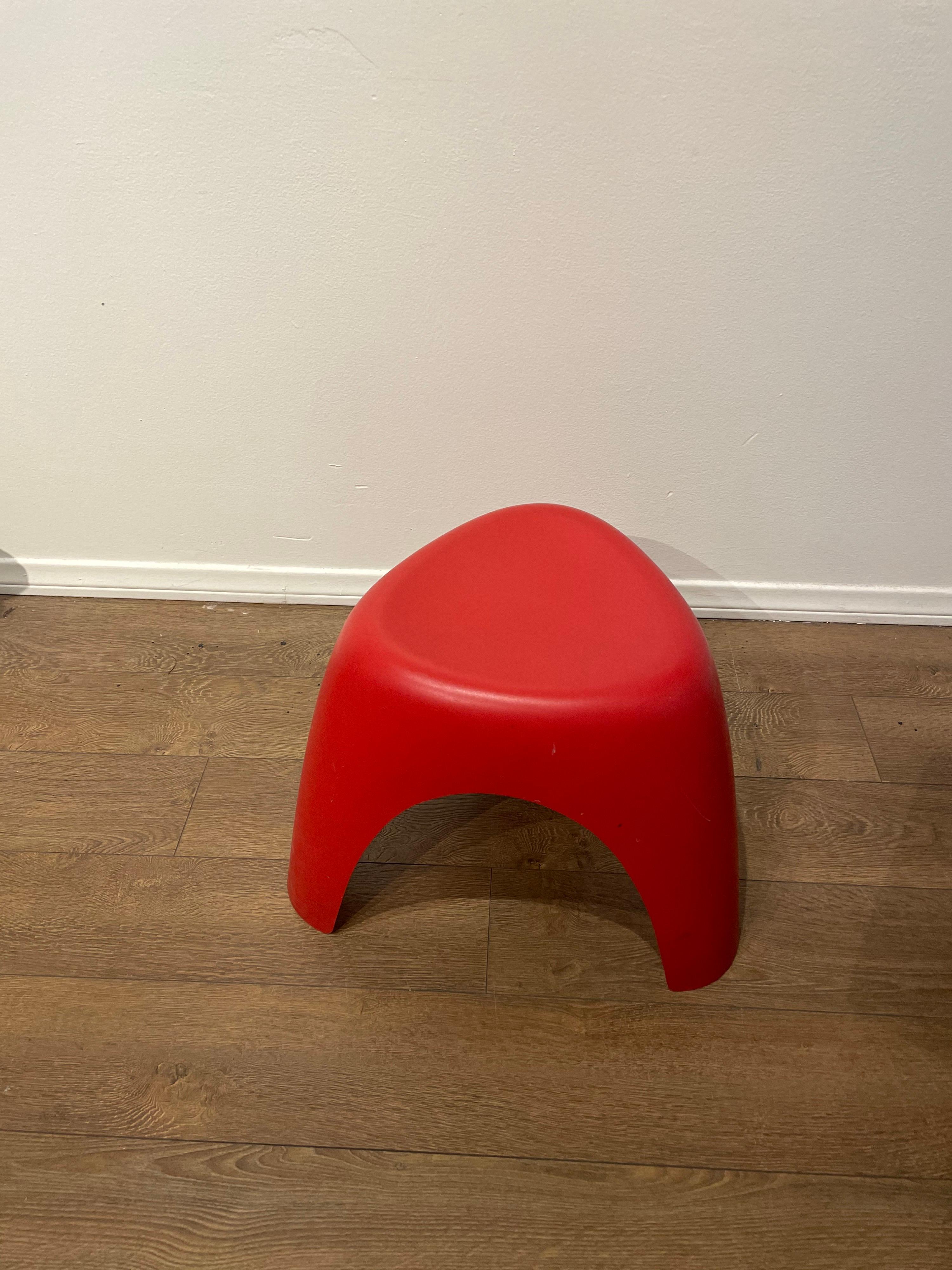 Red molded Plastic elephant stool by Sori Yanagi, for Vitra.
 