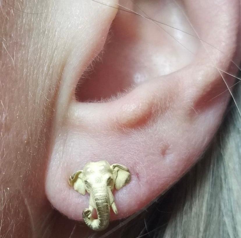 All the majesty, grace, beauty, and wisdom of the regal Elephant is encapsulated in these delicate solid 18k gold earring studs.
Although they are gold, they are small and comfortable enough to be worn every day. Or save them for a special occasion.