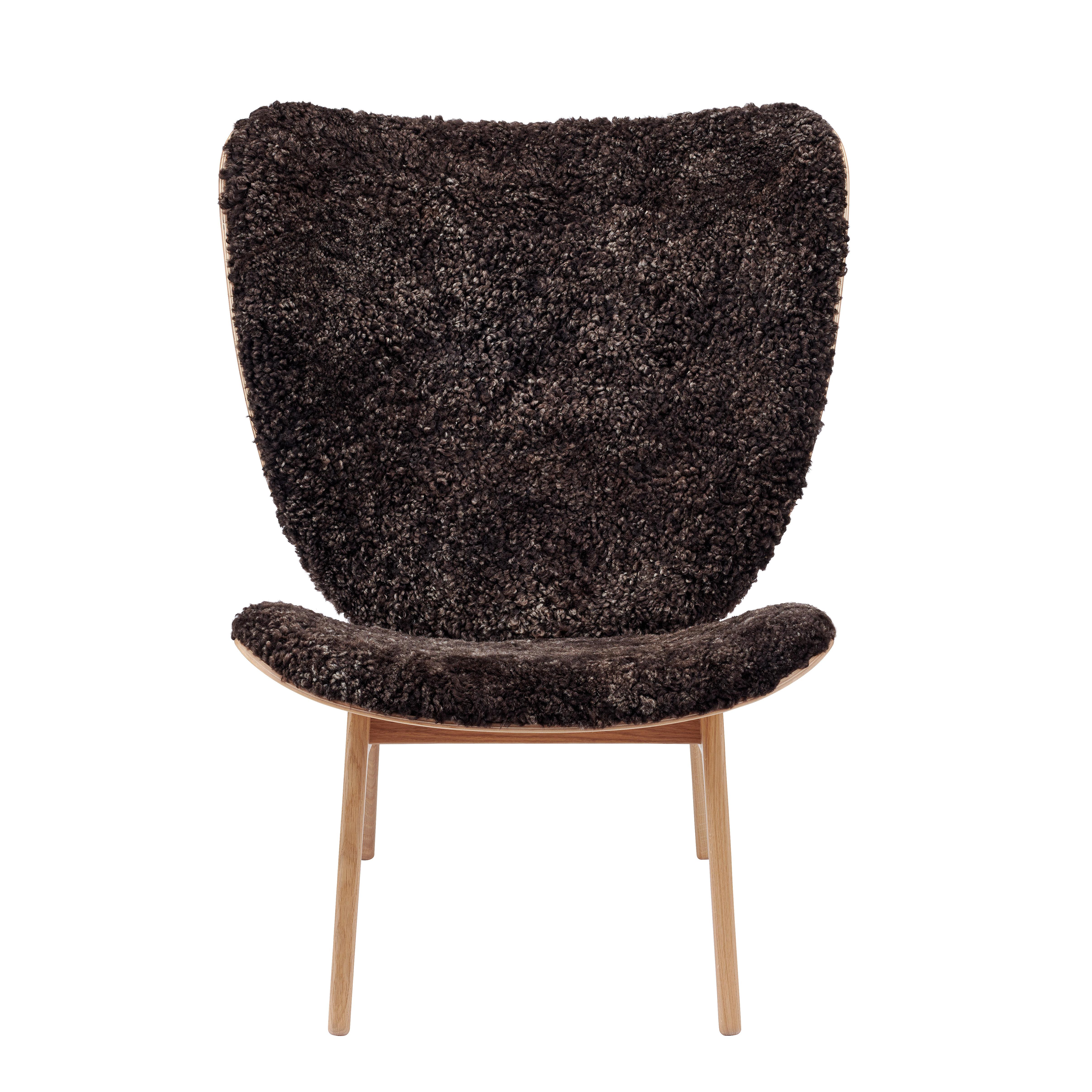 Elephant lounge chair 
Signed by Kristian Sofus Hansen and Tommy Hyldahl for Norr11, 2017

Model shown on the picture:
Wood: Natural Oak
Fabric: Sheepskin Espresso

Wood types available: natural oak / light smoked oak / dark smoked oak / black