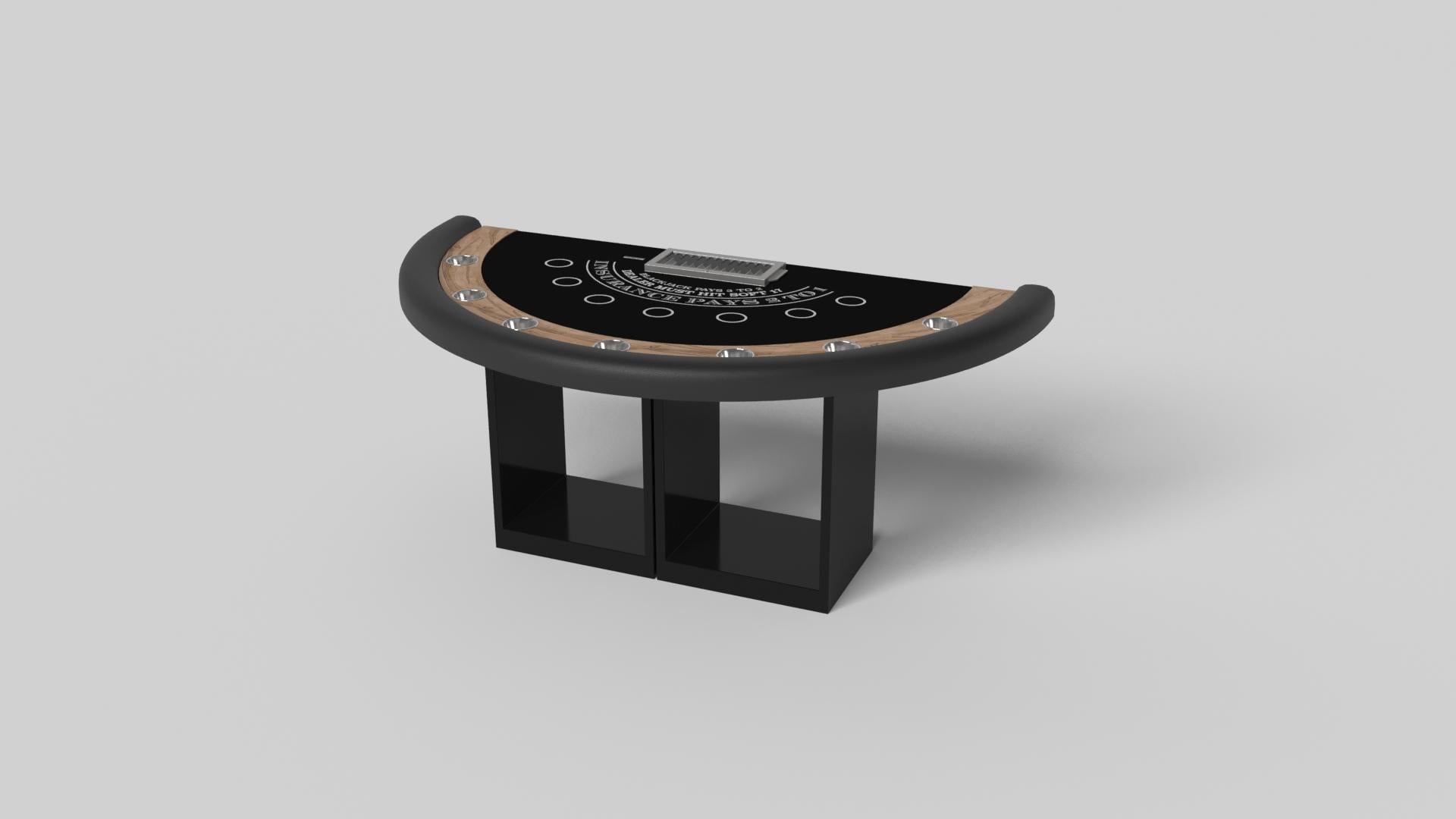 Soutenue par deux piédestaux rectangulaires ouverts en guise de base, la table de blackjack Ambrosia est moderne et minimaliste avec sa combinaison de formes simples et géométriques. Vue de face, l'utilisation de l'espace négatif est évidente ; vue
