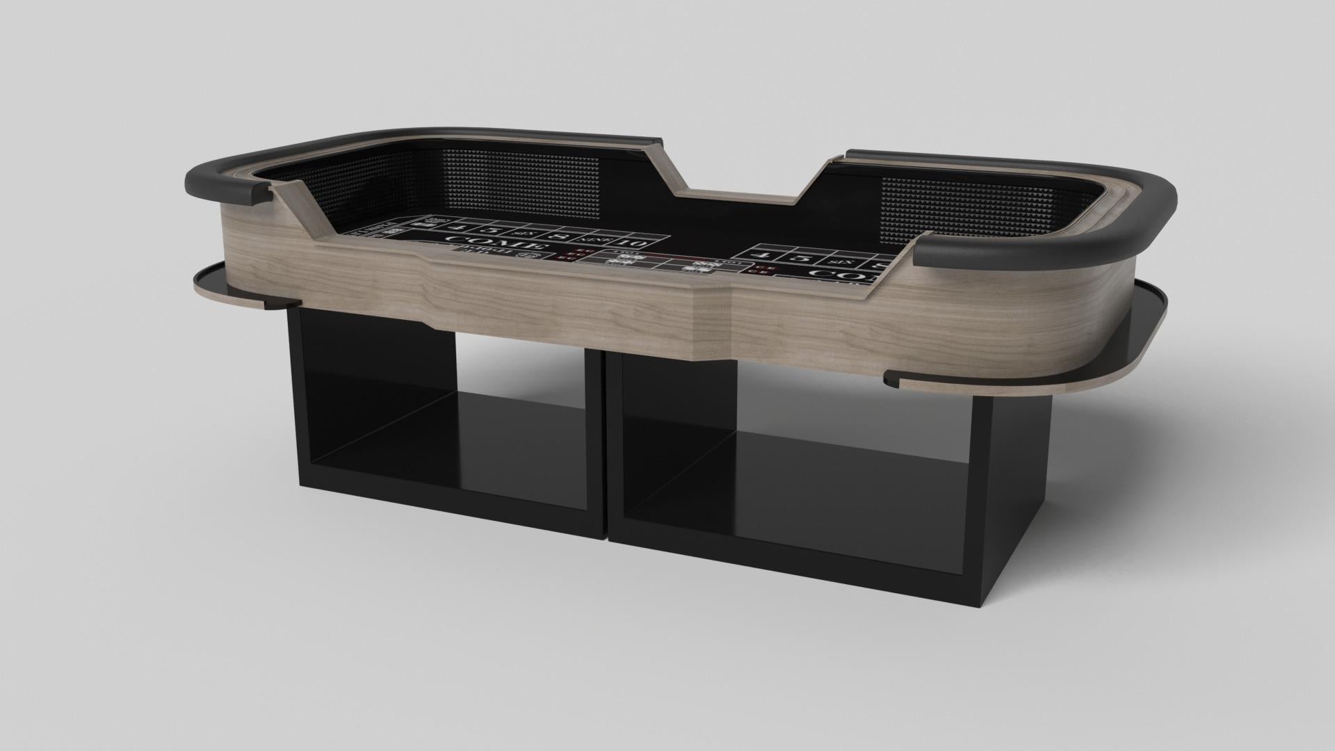 Supported by two rectangular open pedestals as the base, the Ambrosia craps table is modern and minimalistic with its combination of simple, geometric forms. Viewed from the front, the use of negative space is evident; viewed from the side, the base
