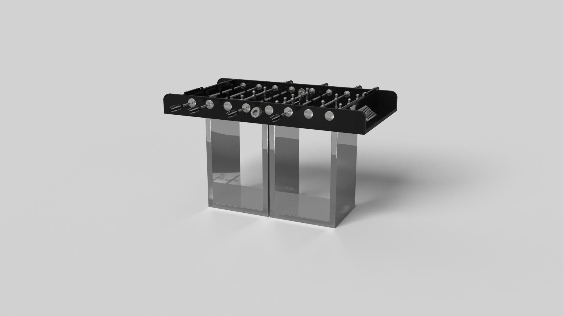 Soutenu par deux socles rectangulaires ouverts en guise de base, ce baby-foot artisanal est moderne et minimaliste avec sa combinaison de formes simples et géométriques. Vue de face, l'utilisation de l'espace négatif est évidente ; vue de côté, la