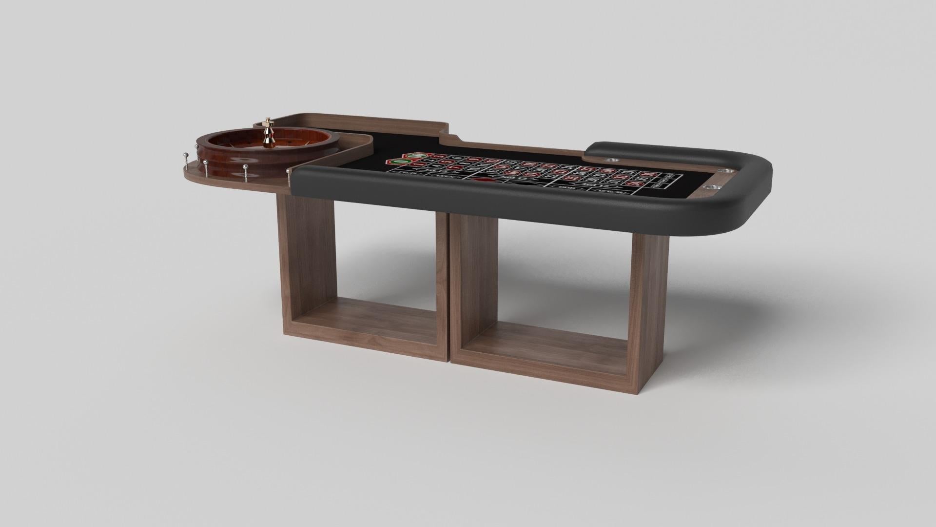Soutenue par deux socles rectangulaires ouverts en guise de base, la table de roulette Ambrosia est moderne et minimaliste avec sa combinaison de formes simples et géométriques. Vue de face, l'utilisation de l'espace négatif est évidente ; vue de