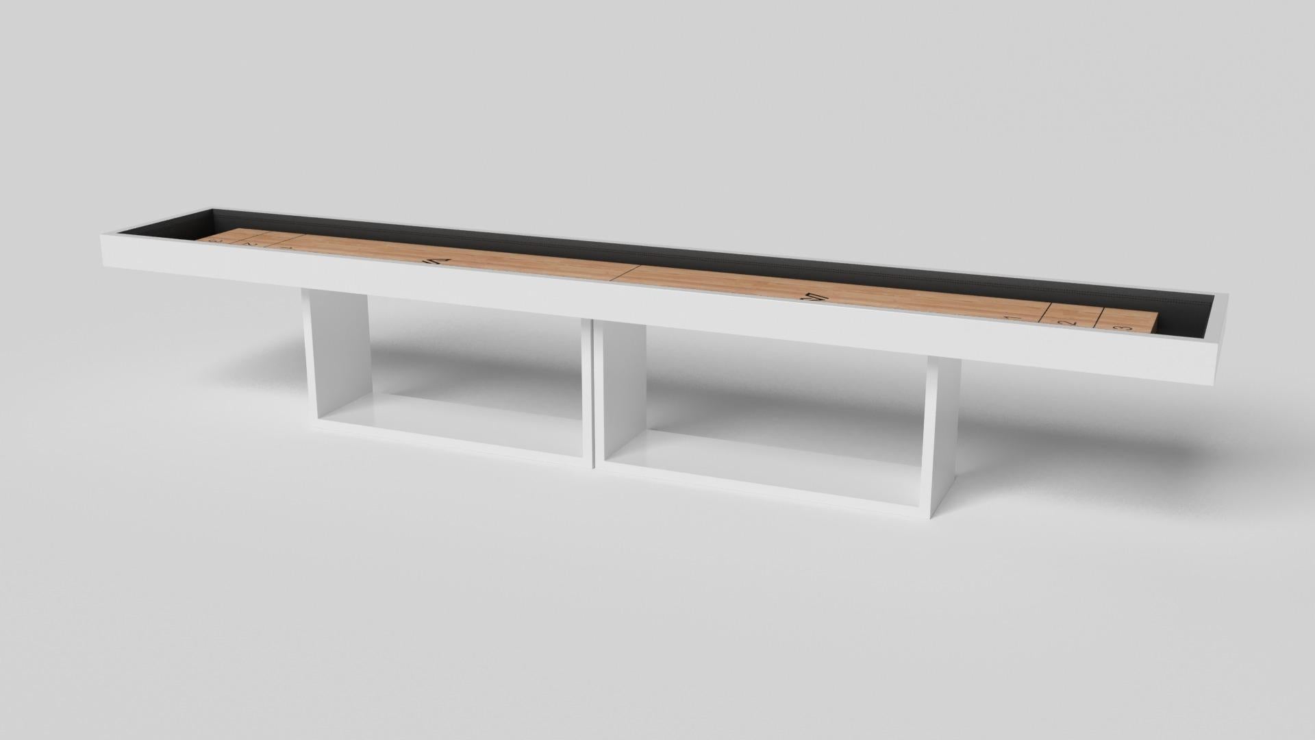 Supported by two rectangular open pedestals as the base, this handcrafted shuffleboard table is modern and minimalistic with its combination of simple, geometric forms. Viewed from the front, the use of negative space is evident; viewed from the