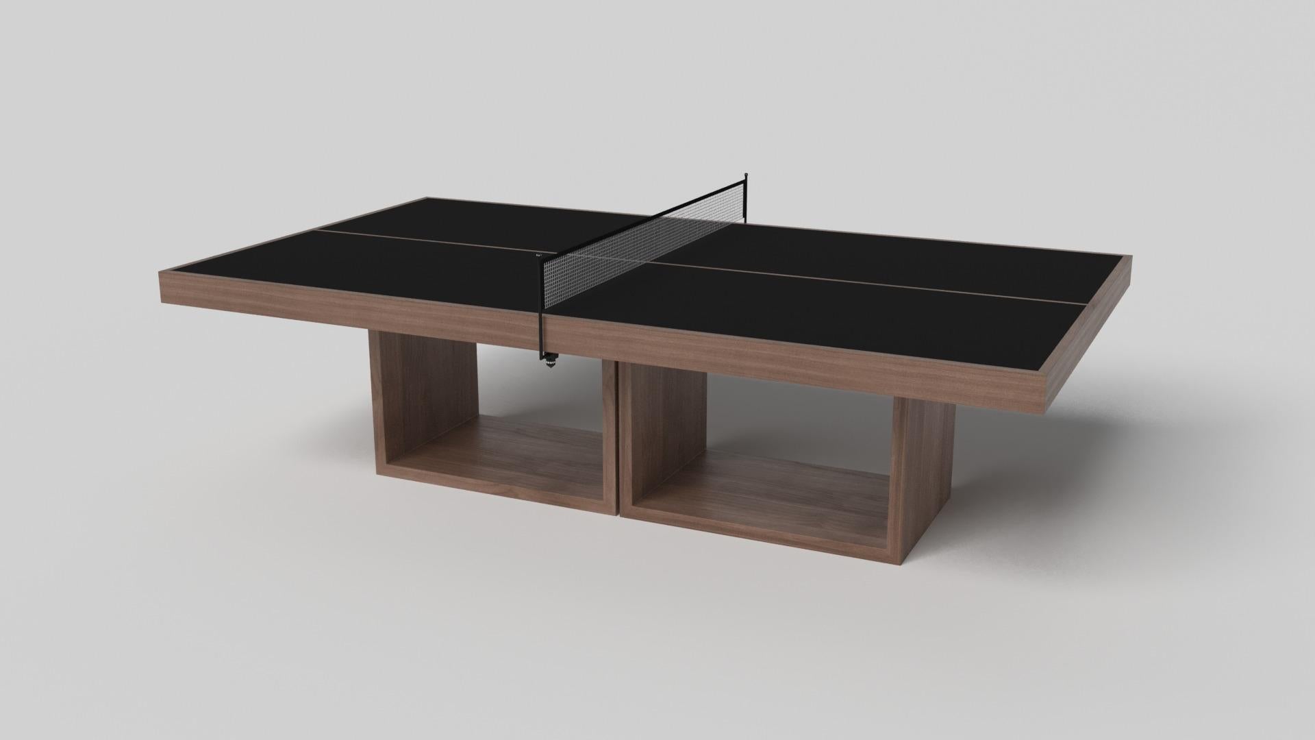 Supported by two rectangular open pedestals as the base, this handcrafted table tennis table is modern and minimalistic with its combination of simple, geometric forms. Viewed from the front, the use of negative space is evident; viewed from the
