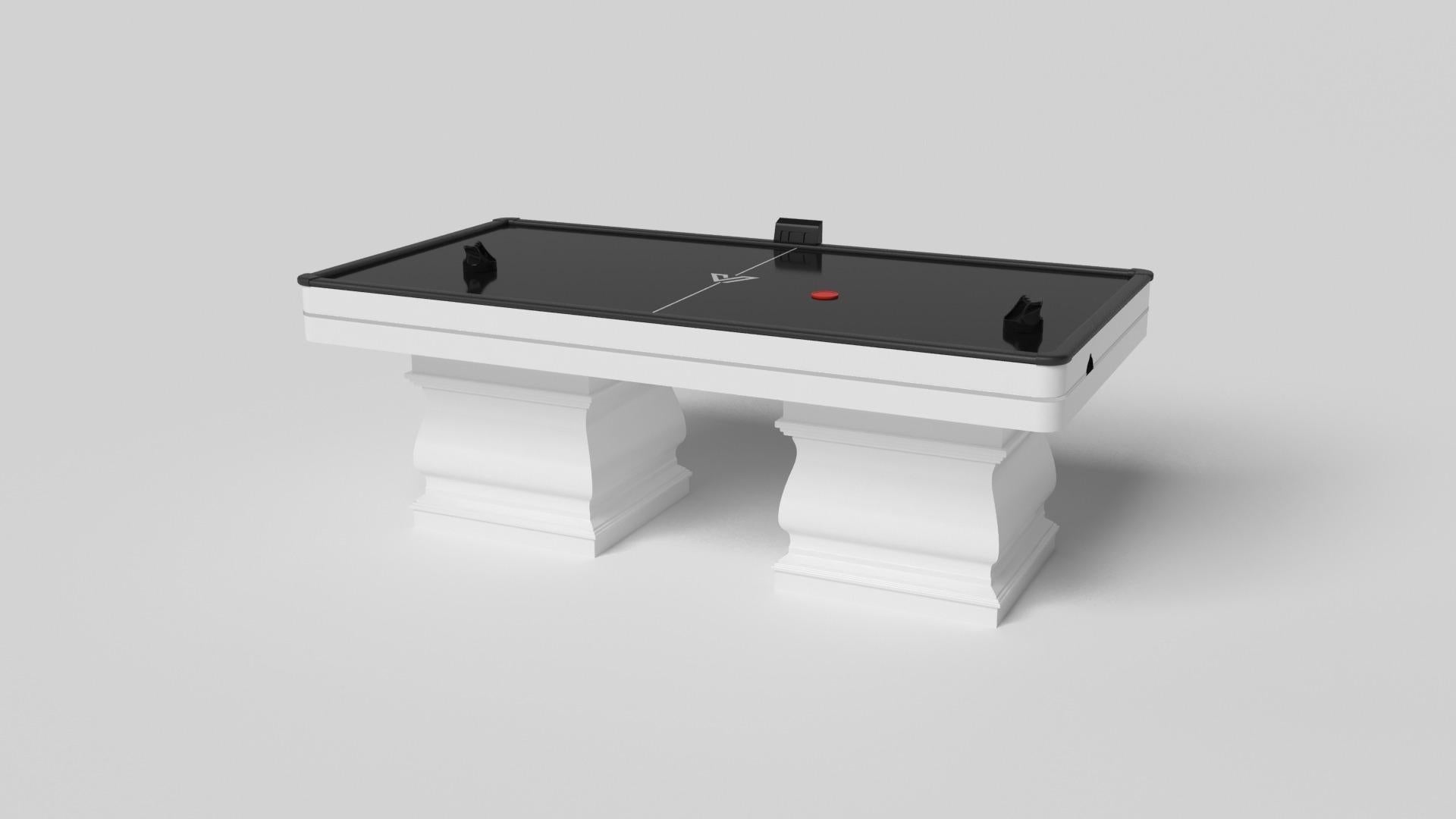 Two hand-sculpted legs bestow a sense of classic style upon this handcrafted air hockey table in white. This luxury wood game table features a smooth rectangular top perched upon two wide baluster column legs that mimic the curves and lines of crown