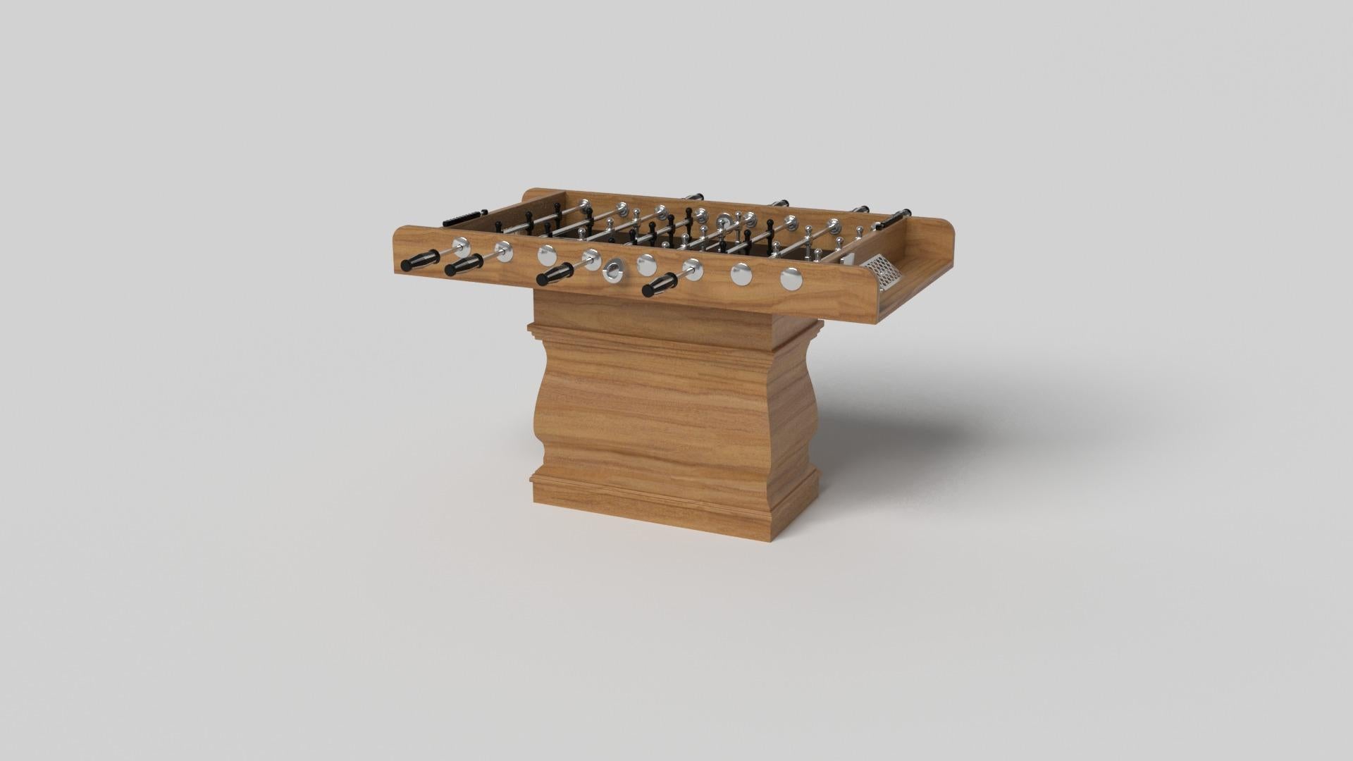 A single hand-sculpted leg bestows a sense of classic style upon this handcrafted foosball table in white. This luxury wood game table features a smooth rectangular top perched upon two wide baluster column legs that mimic the curves and lines of
