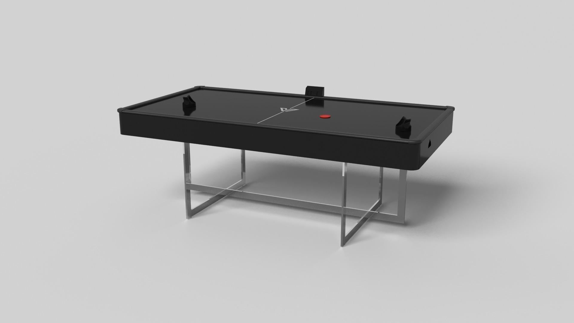 Avec une base ouverte en métal, notre table Beso est une expression unique de formes contemporaines et d'espace négatif. Cette table d'air hockey est fabriquée à la main par nos maîtres artisans avec une base rectangle dans rectangle qui reprend les