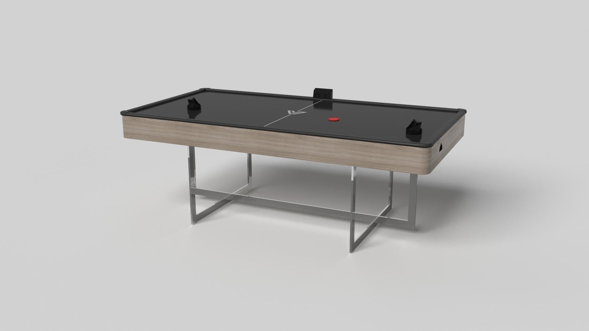 Mit seinem offenen Metallgestell ist unser Beso-Tisch ein einzigartiger Ausdruck von zeitgenössischen Formen und negativem Raum. Dieser Airhockey-Tisch wird von unseren Meisterhandwerkern mit einem rechteckigen Unterbau gefertigt, der die Ecken und