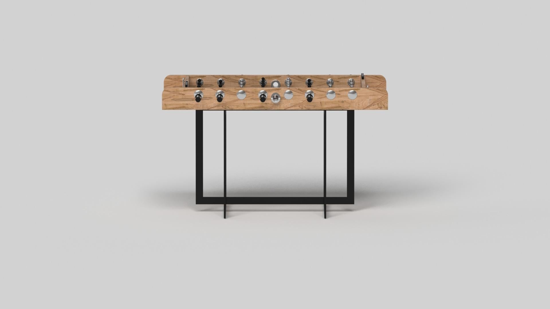 With an open metal foundation, our Beso table is a unique expression of contemporary forms and negative space. This foosball table is handcrafted by our master artisans with a rectangle-in-rectangle base that echoes the angles and edges of a